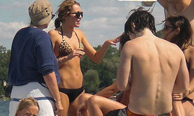 Miley Cyrus bikini candids on the set of LOL Laughing Out Loud