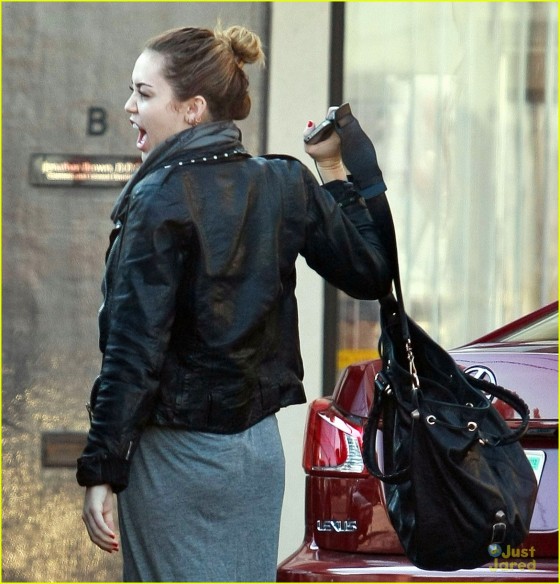 Miley Cyrus - outside of a laser tattoo removal office in ...