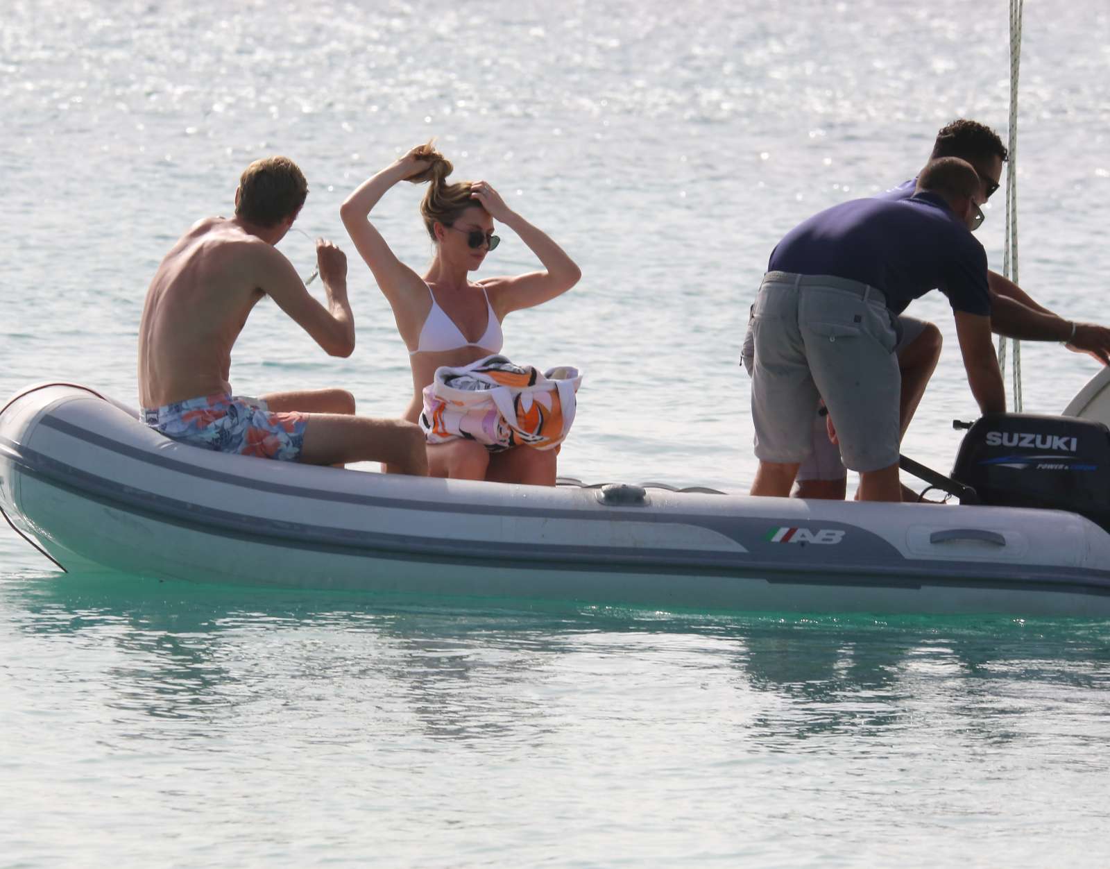 Abbey Clancy in White Bikini on a Yacht in Barbados