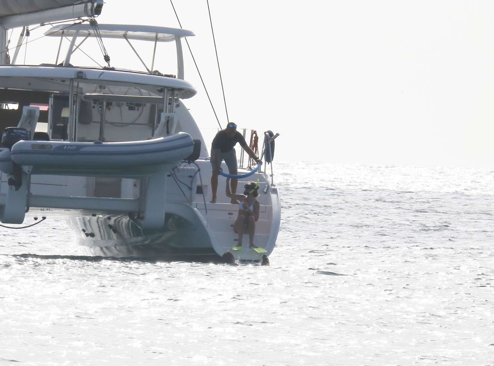 Abbey Clancy in White Bikini on a Yacht in Barbados