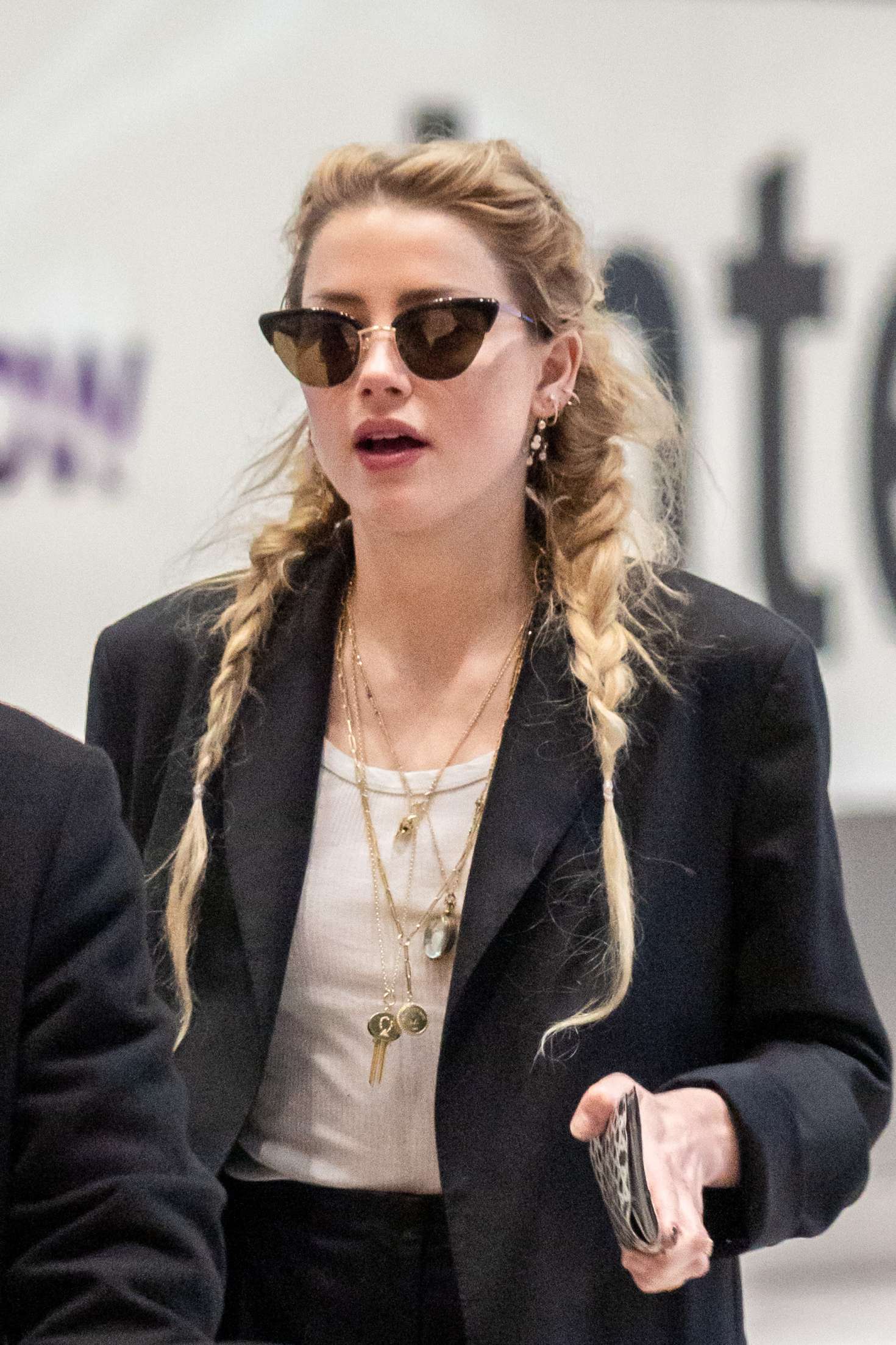 Amber Heard â€“ Arrives at Heathrow Airport in London