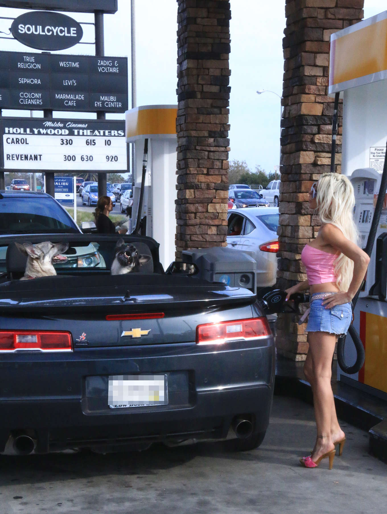 Angelique Morgan in Short Skirt at a gas station in LA
