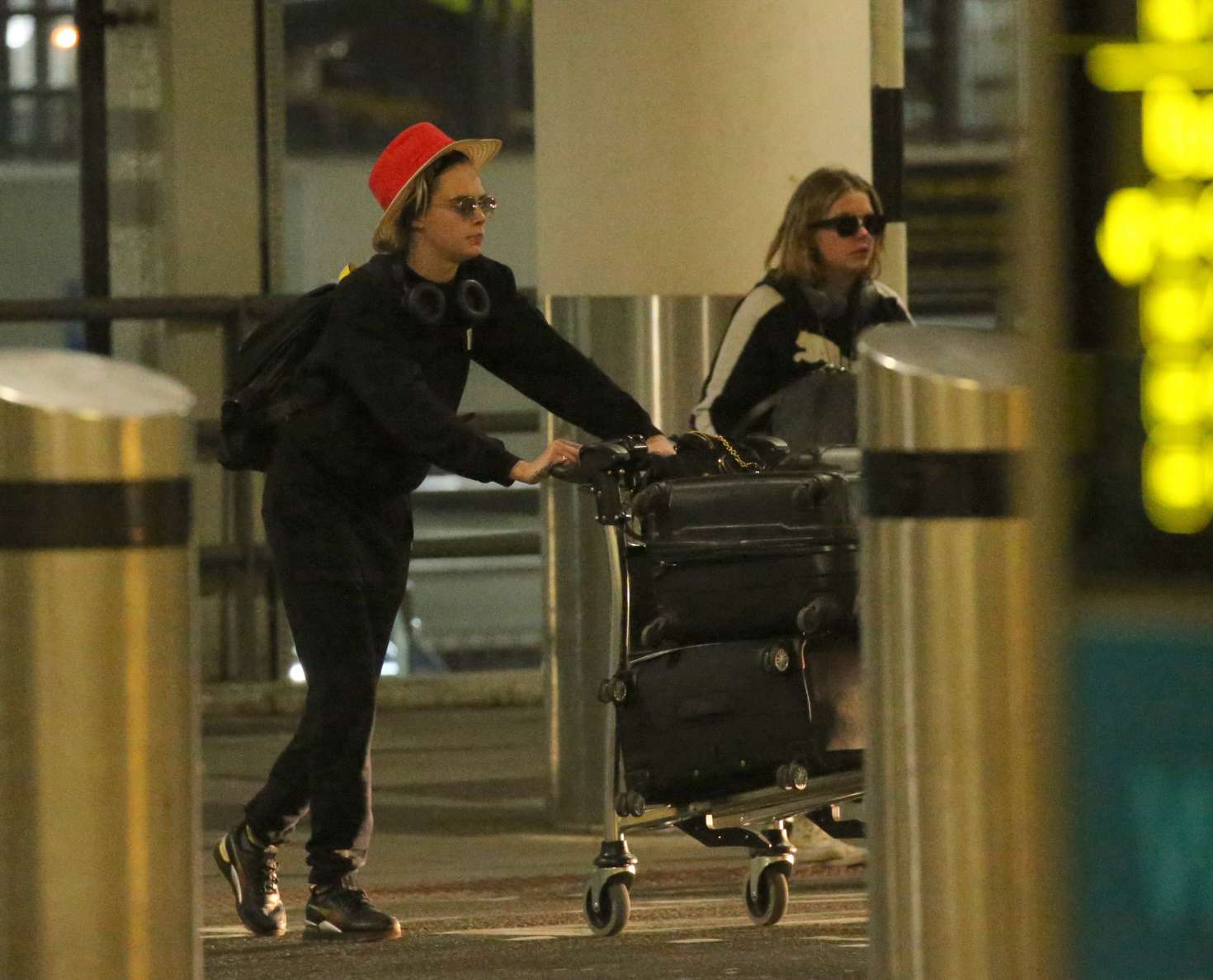 Ashley Benson and Cara Delevingne â€“ Arrives at Gatwick Airport in England