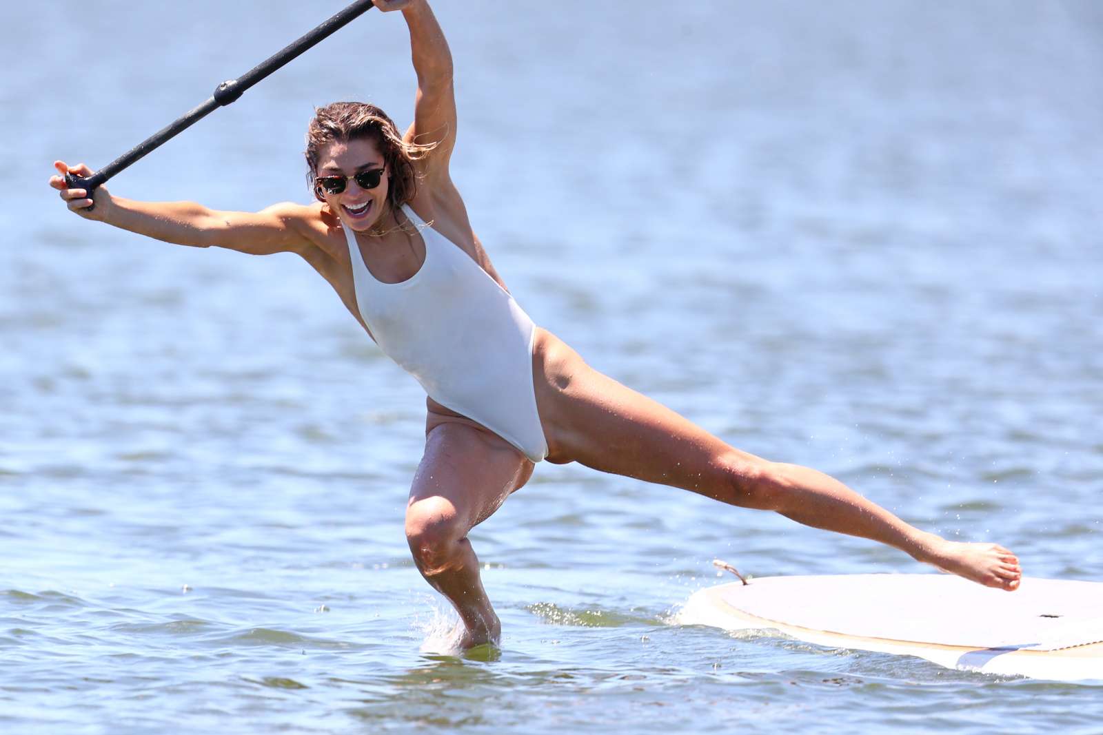 Ashley Hart in White Swimsuit Paddleboarding in New York
