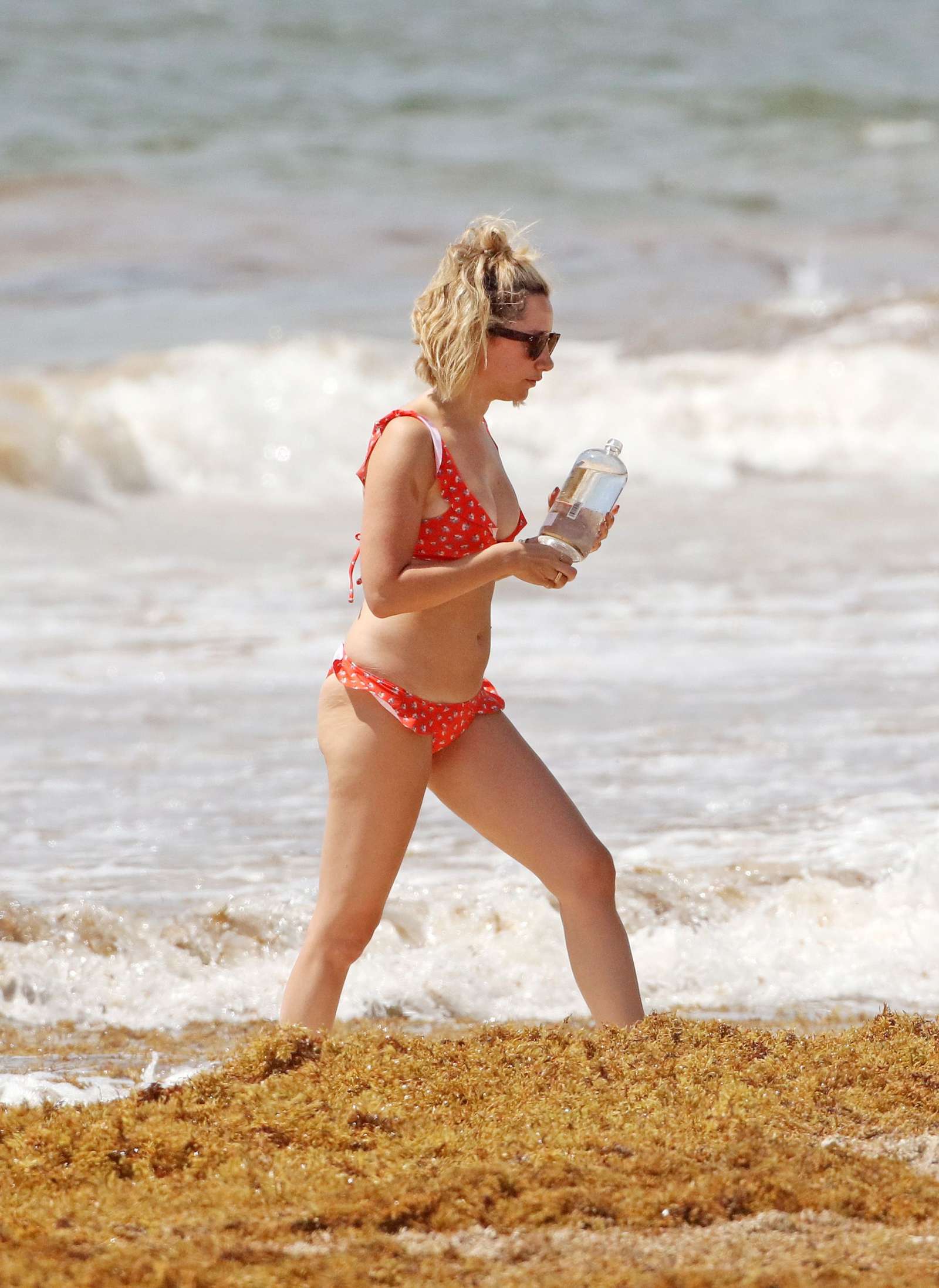 Ashley Tisdale in Red Bikini at a beach in Mexico