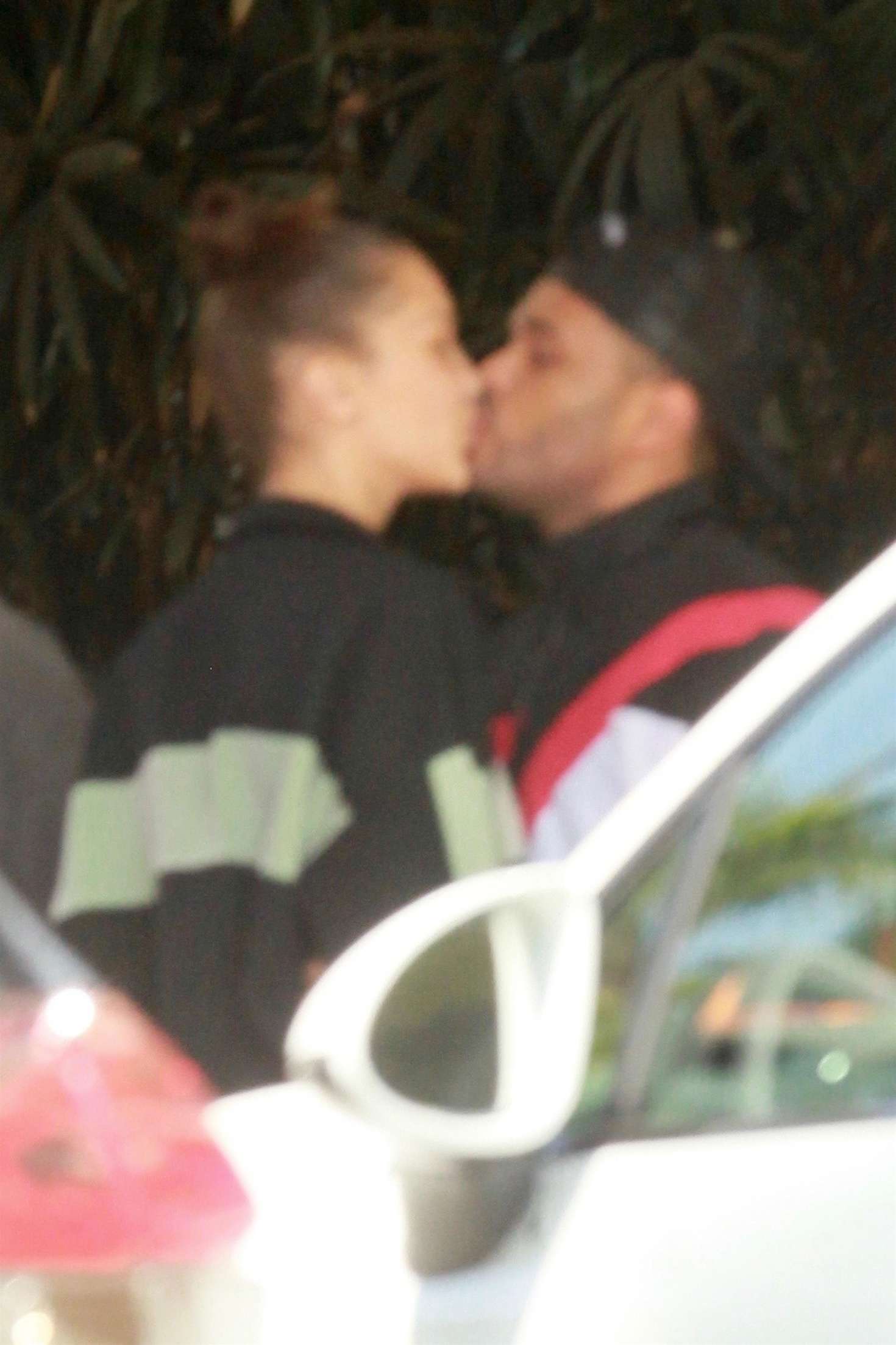 Bella Hadid and The Weeknd â€“ Share a kiss in Los Angeles