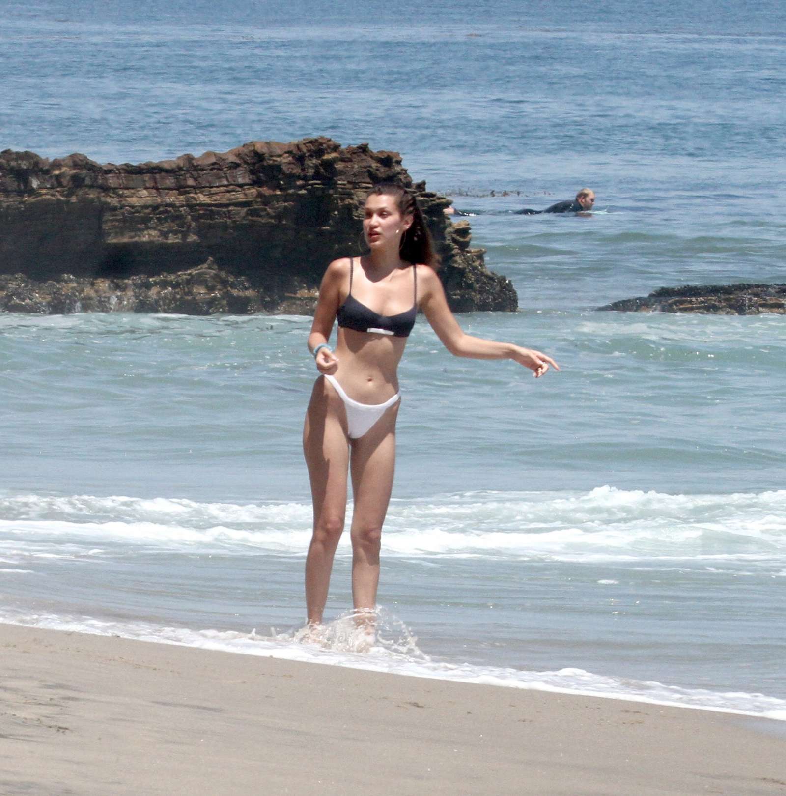 Bella Hadid in Black and White Bikini at the beach in Thousand Oaks