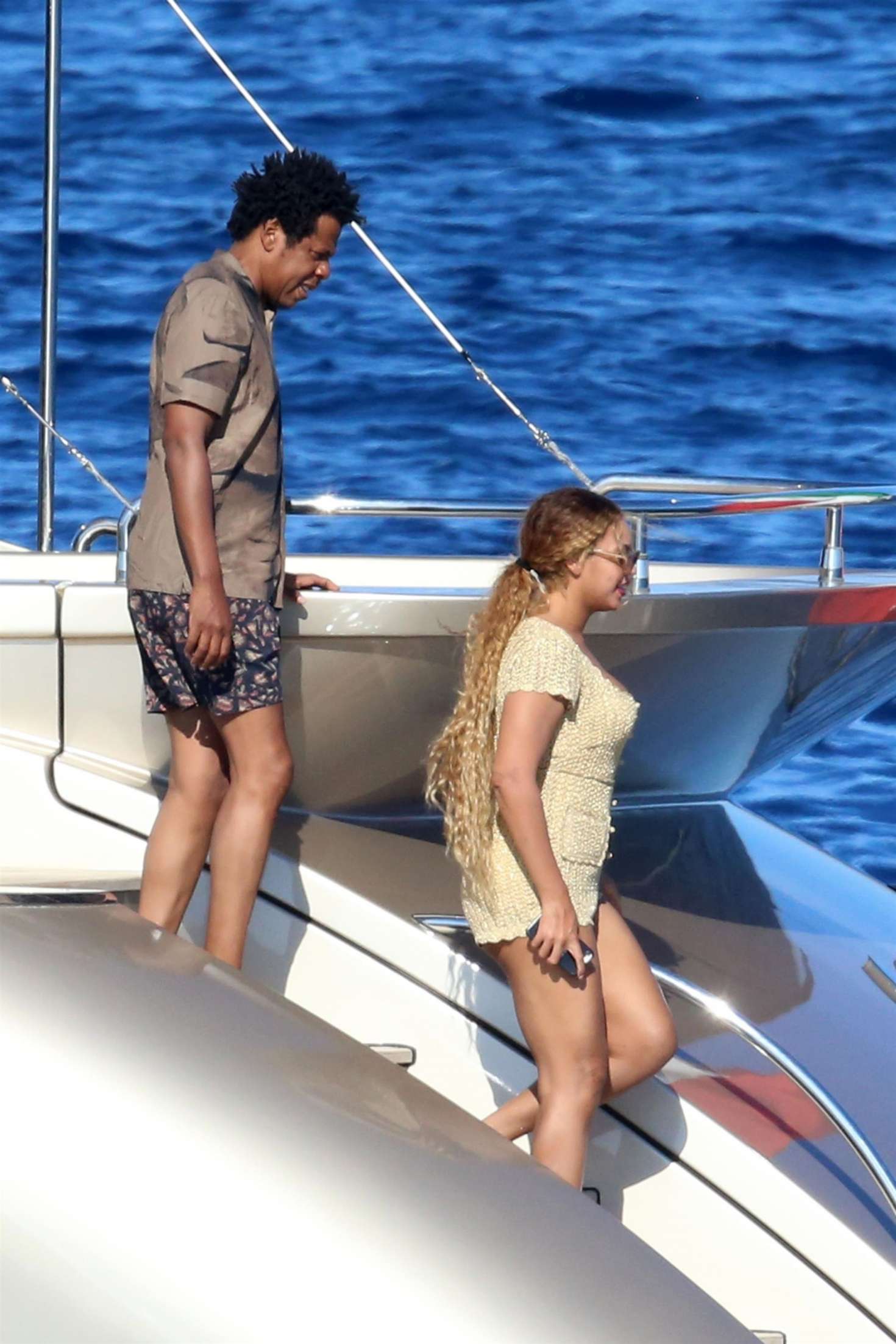Beyonce â€“ Wearing a tan romper in Sardinia