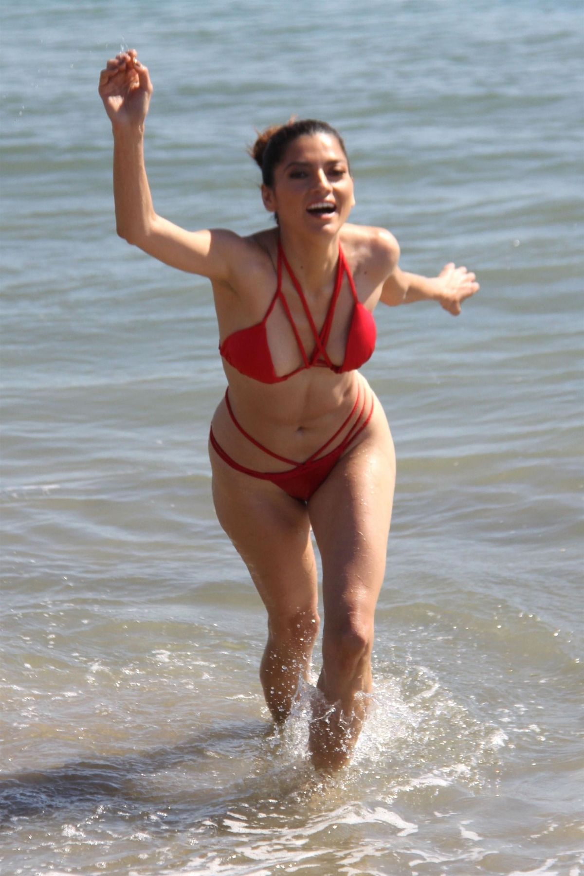 Blanca Blanco in Red Bikini on Malibu Beach
