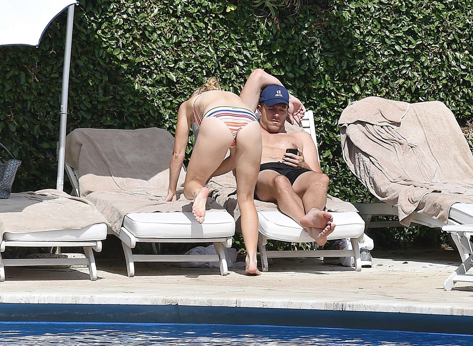 Caroline Wozniacki in Bikini on the pool in Portofino