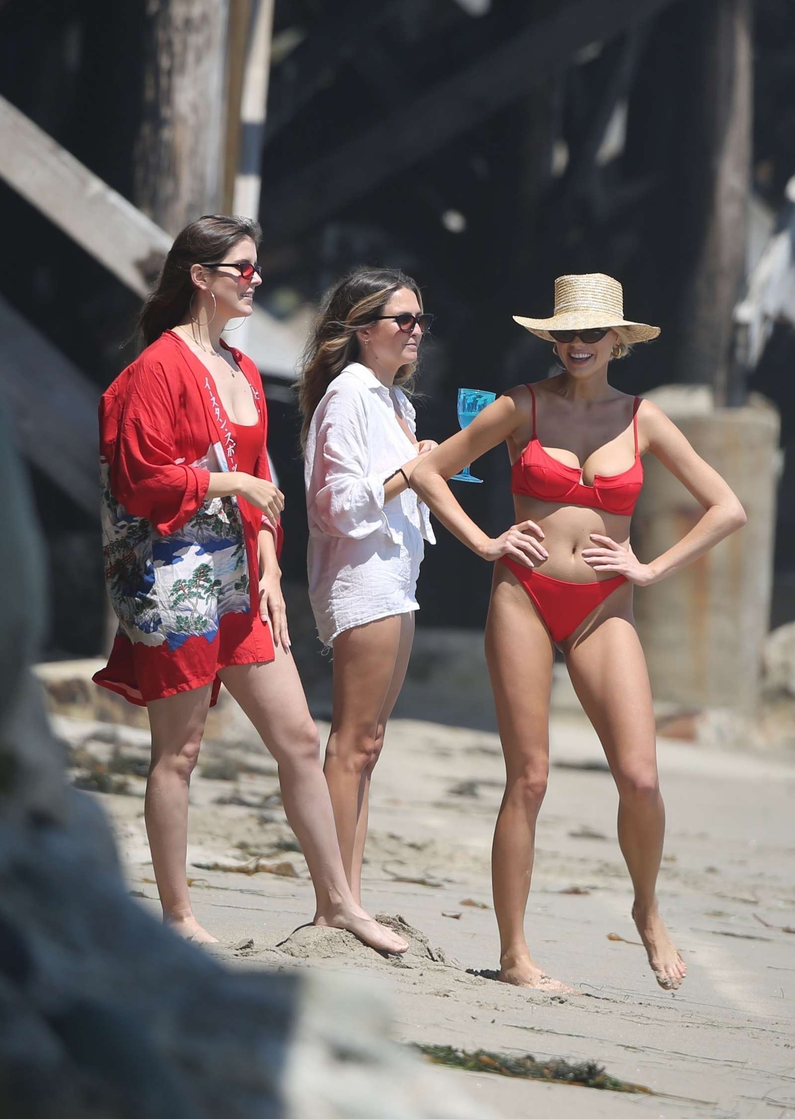 Charlotte McKinney â€“ Seen wearing a red bikini at the beach in LA