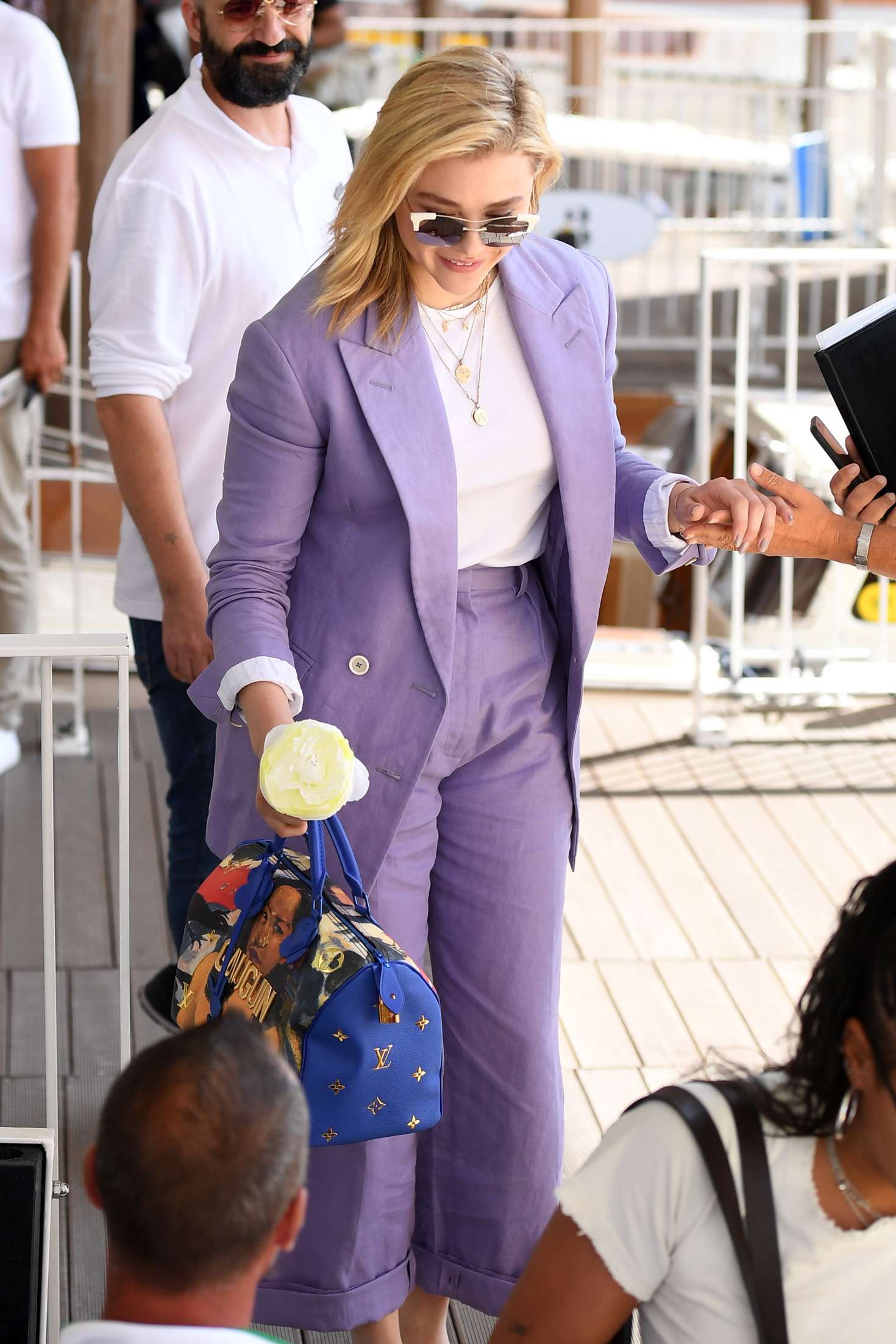 Chloe Moretz in Purple Suit â€“ Arrives in Venice