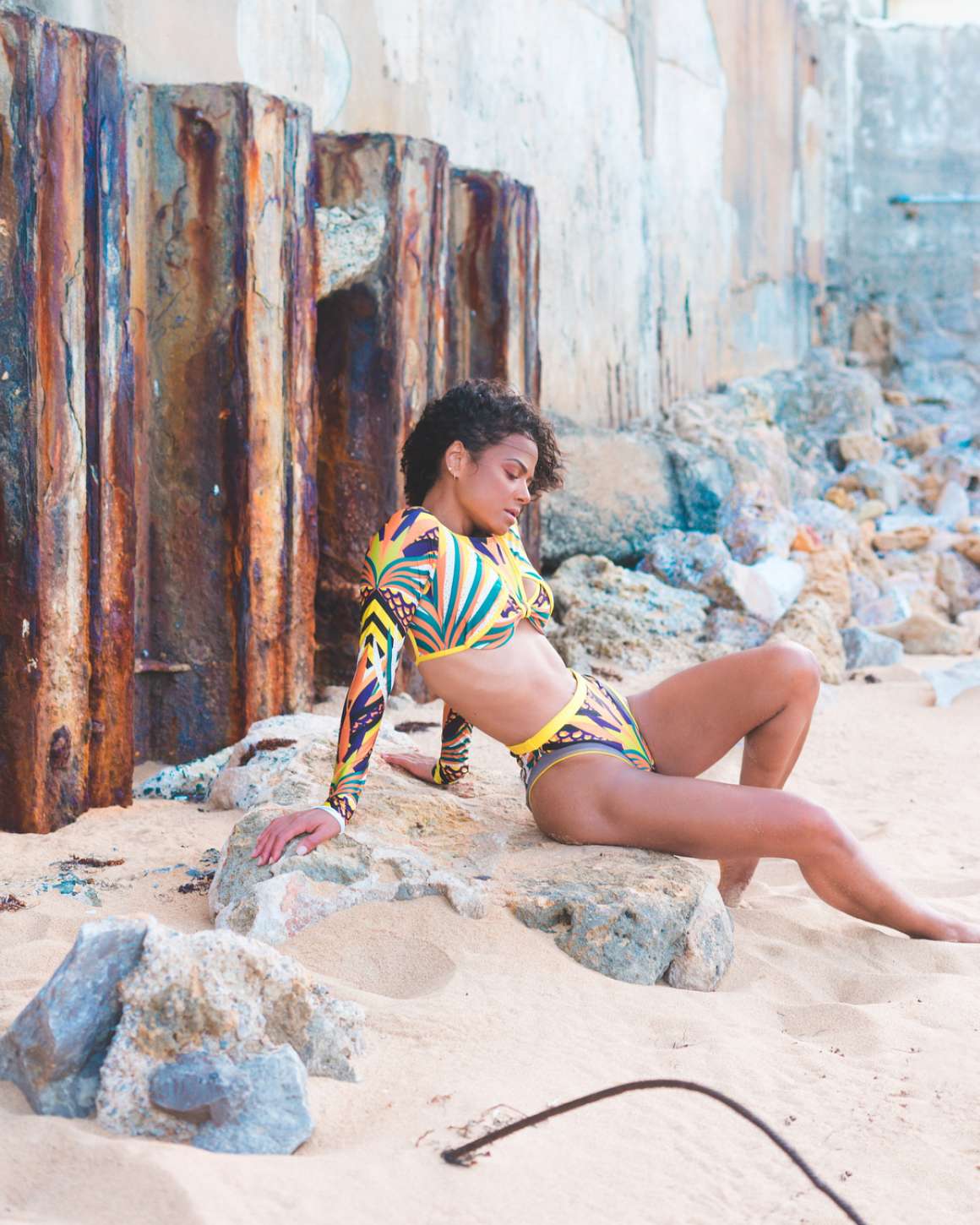 Christina Milian in Multi-colored Swimsuit â€“ Photoshoot