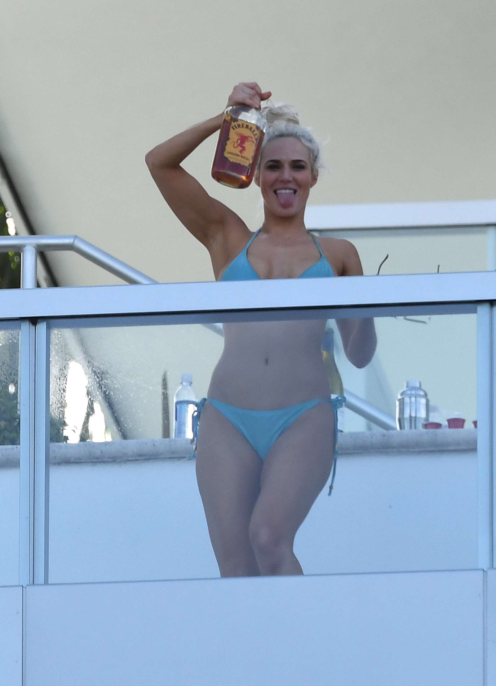 CJ Perry Lana in Blue Bikini on a balcony in Miami