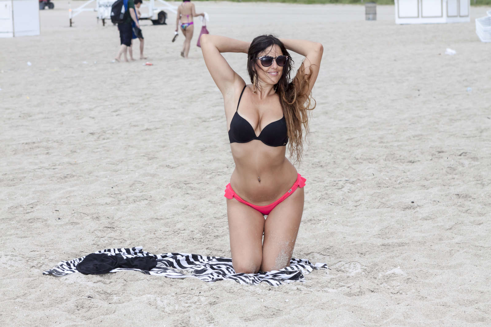 Claudia Romani in Red and Black Bikini in Miami