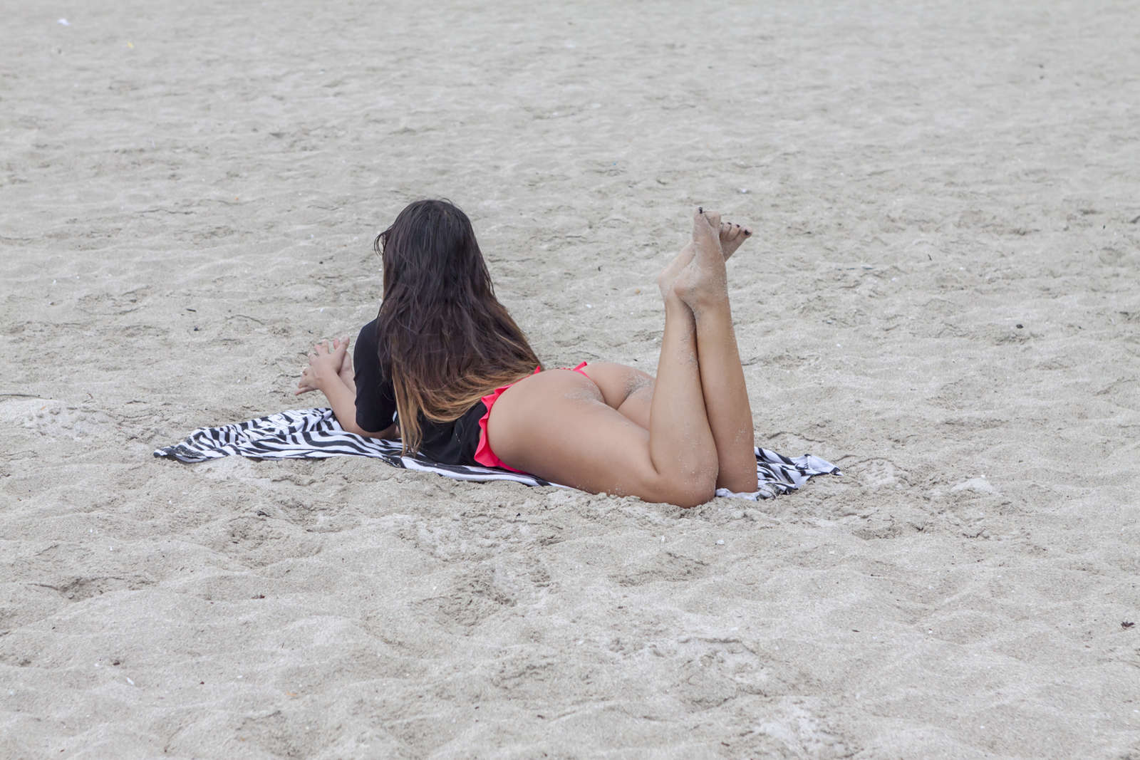 Claudia Romani in Red and Black Bikini in Miami