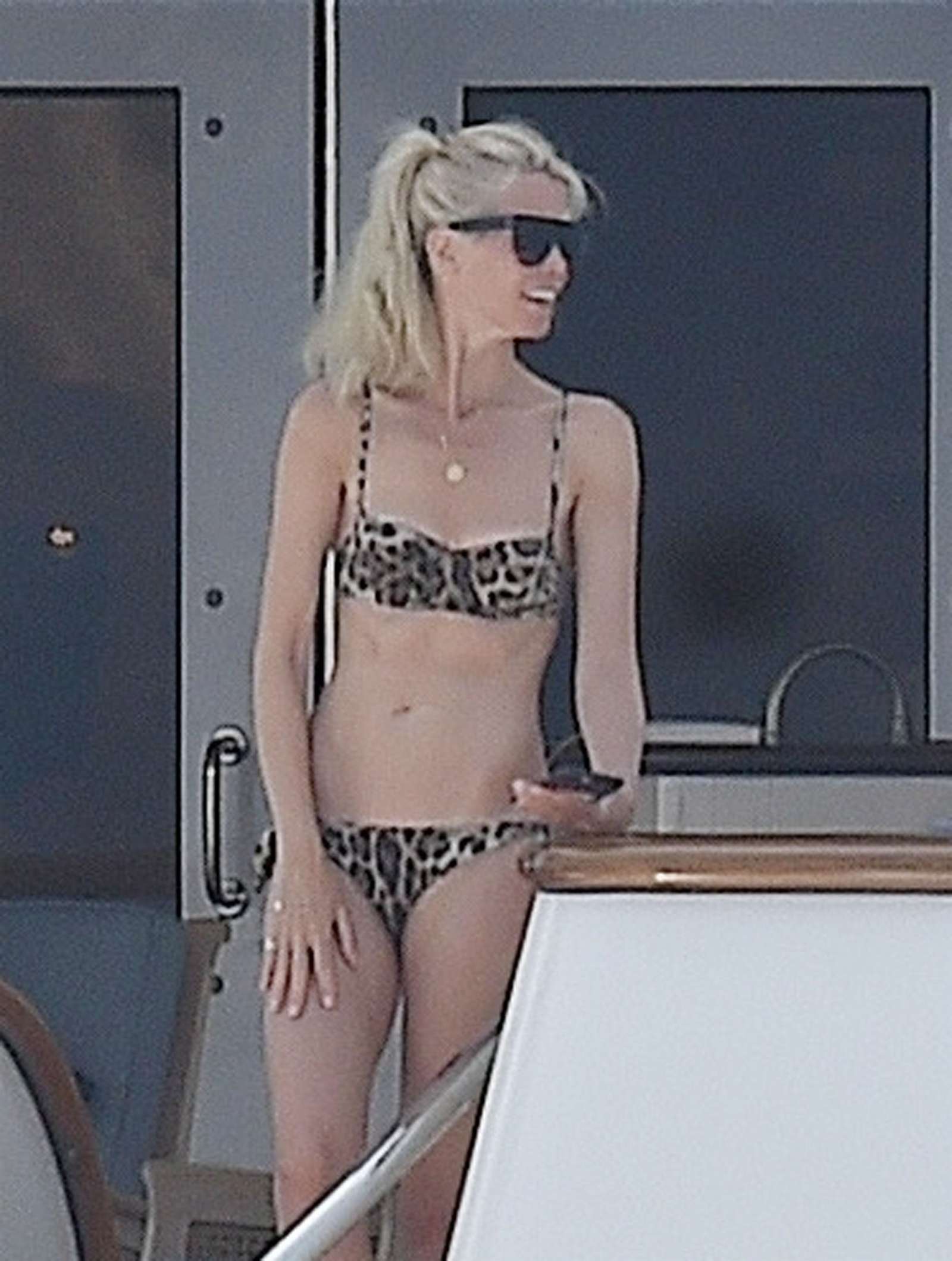 Claudia Schiffer in Animal Print Bikini on a yacht in Portofino