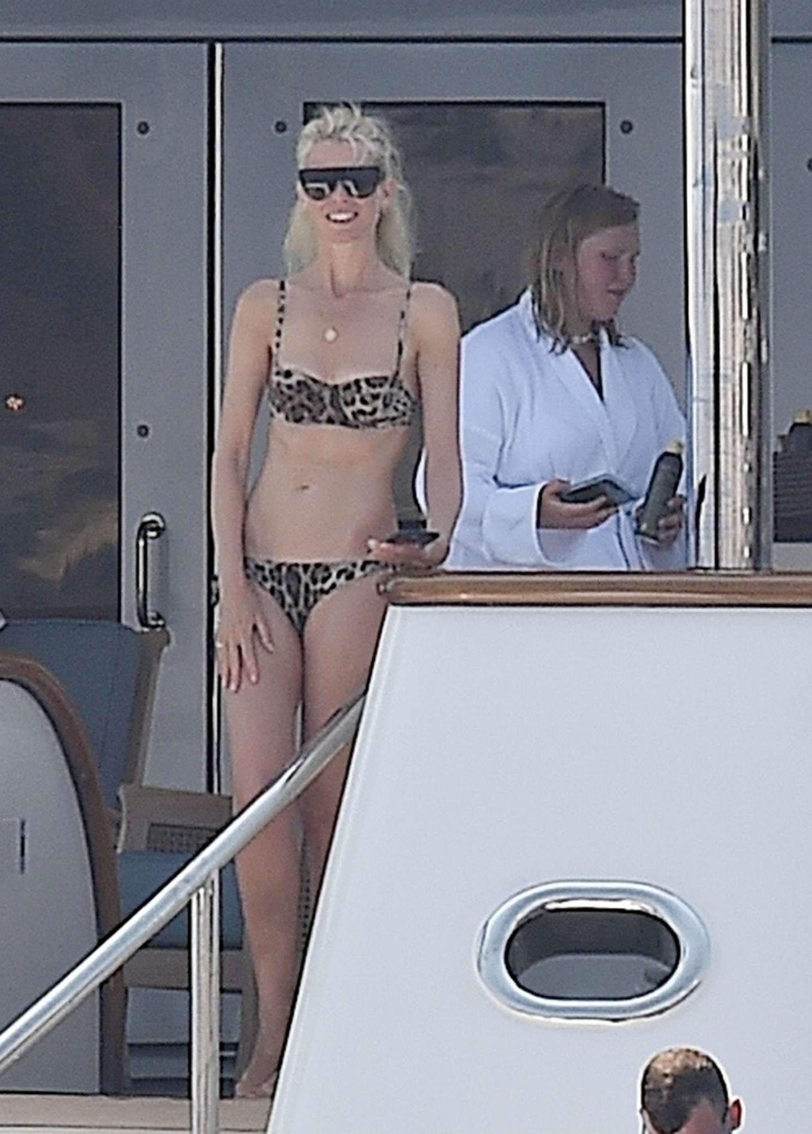 Claudia Schiffer in Animal Print Bikini on a yacht in Portofino