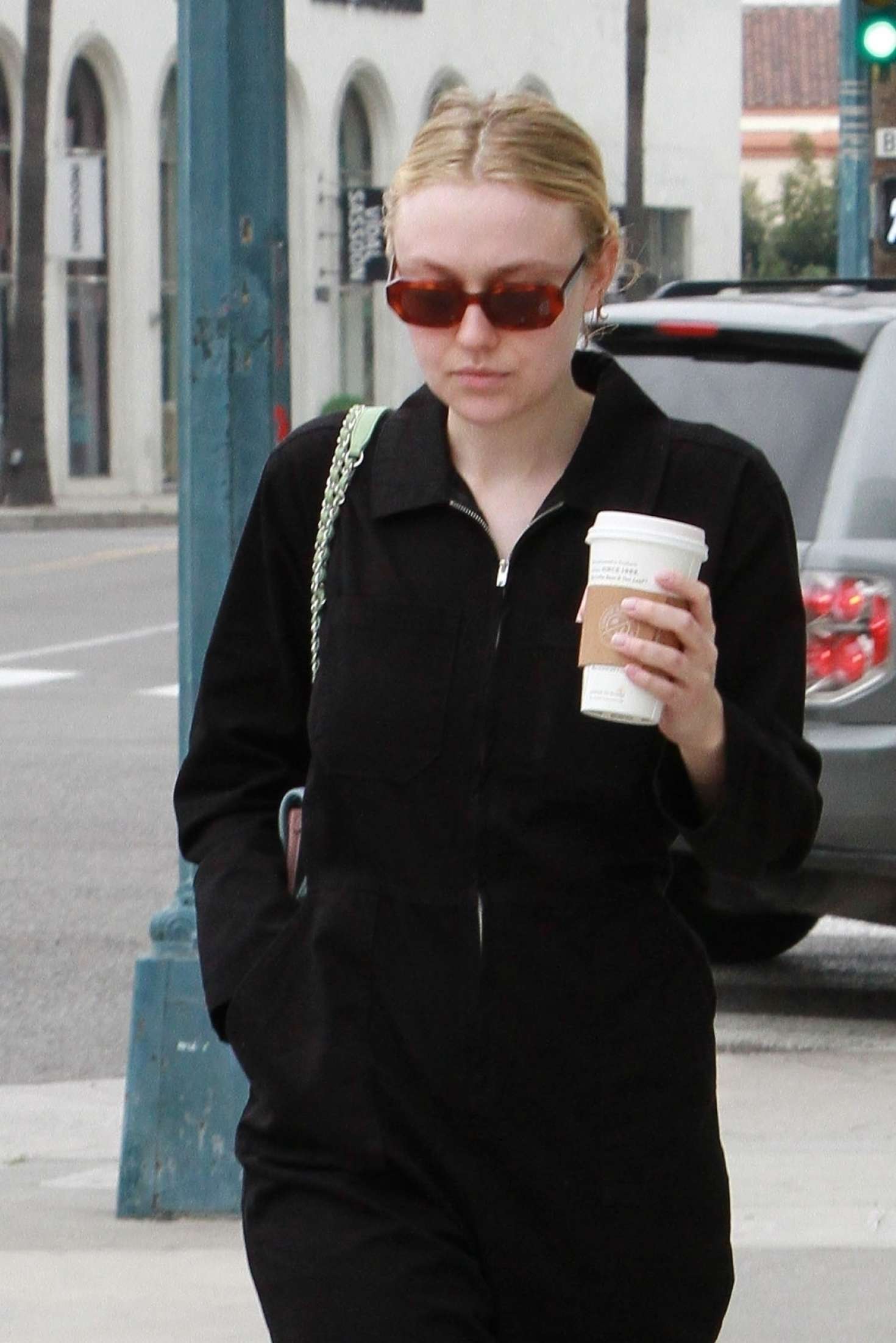 Dakota Fanning in Black Jumpsuit â€“ Getting coffee in Beverly Hills