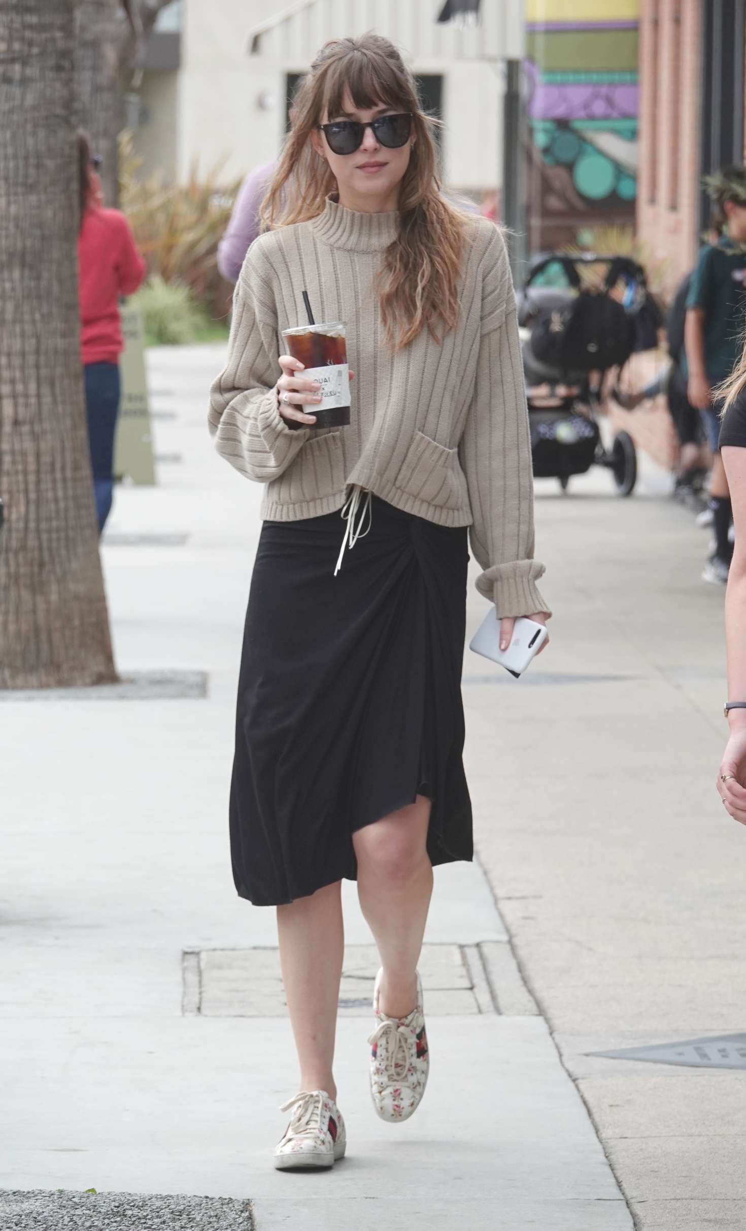 Dakota Johnson in Black Skirt out in Los Angeles