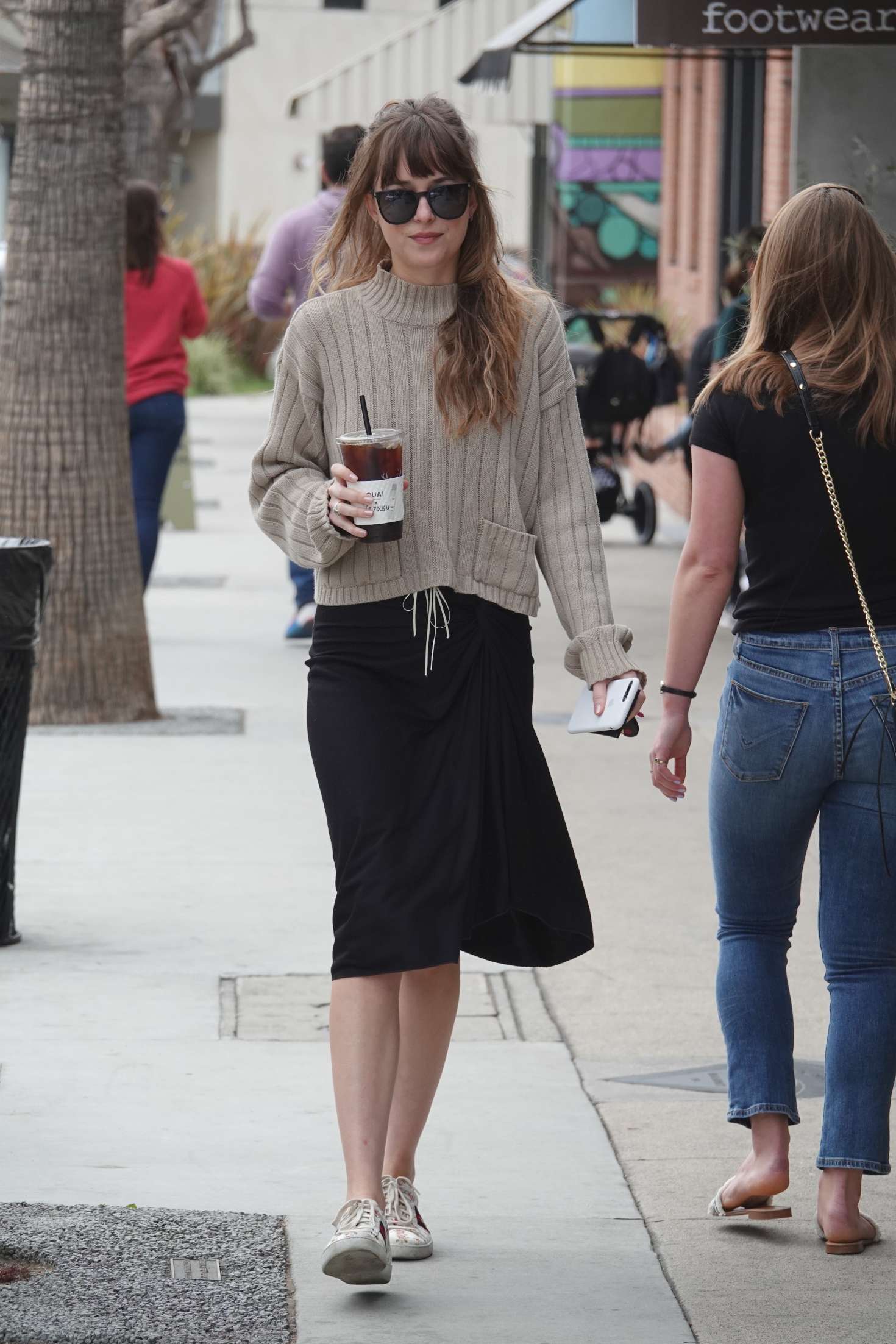 Dakota Johnson in Black Skirt out in Los Angeles