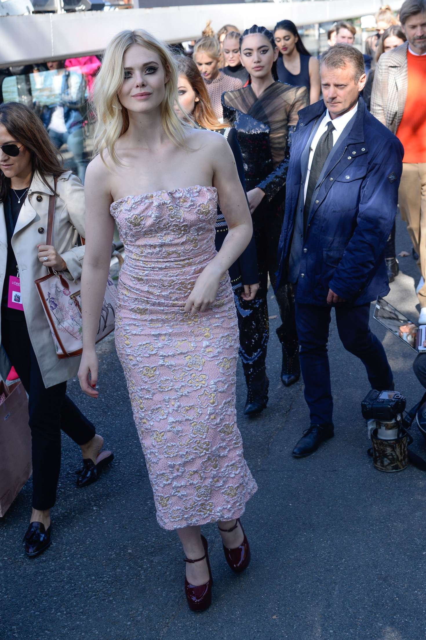 Elle Fanning â€“ Arriving at the Aftershow of the Lâ€™Oreal Fashion Show in Paris