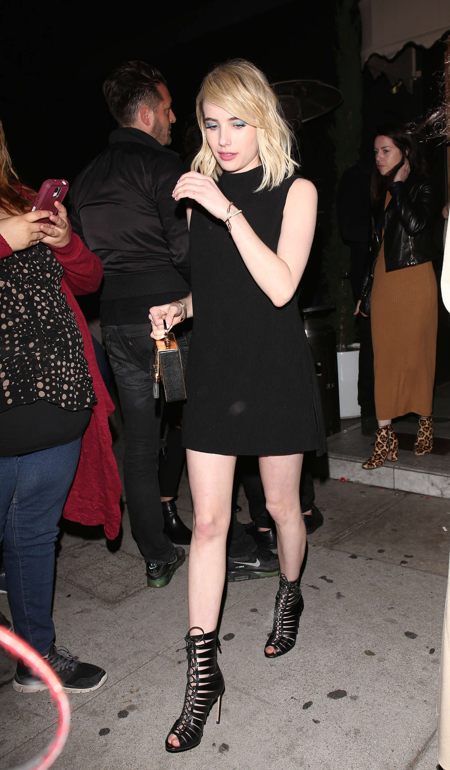 Emma Roberts in Black Mini Dress at The Nice Guy in West Hollywood