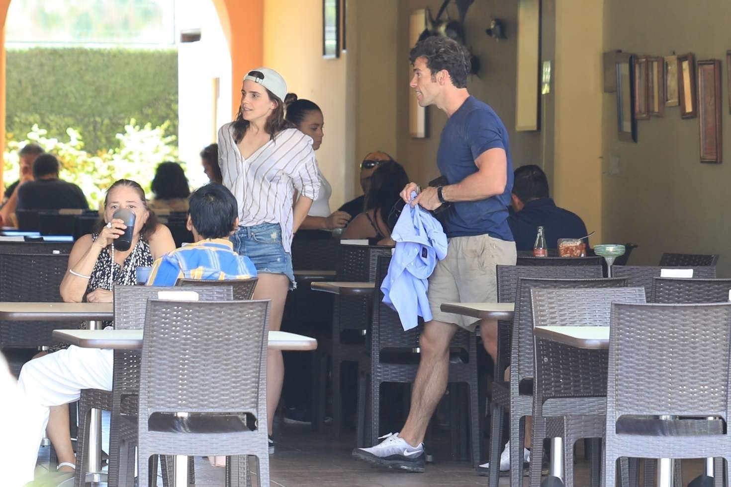 Emma Watson in Denim Shorts with Brendan Wallace on vacation in Mexico