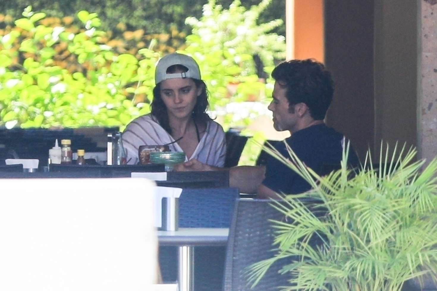 Emma Watson in Denim Shorts with Brendan Wallace on vacation in Mexico
