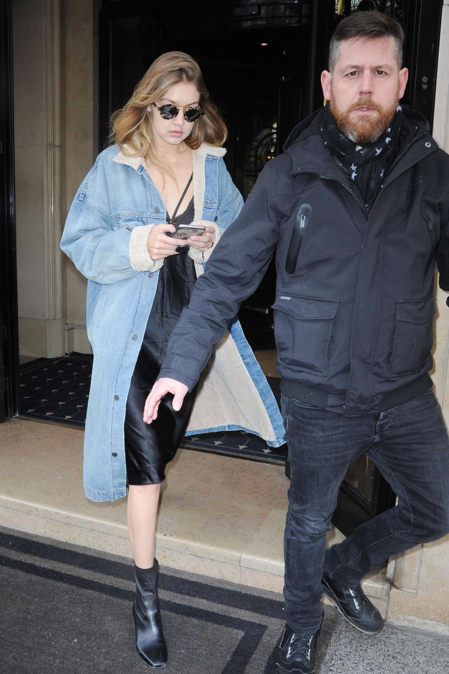 Gigi Hadid in Jeans Coat Leaving her Hotel in Paris