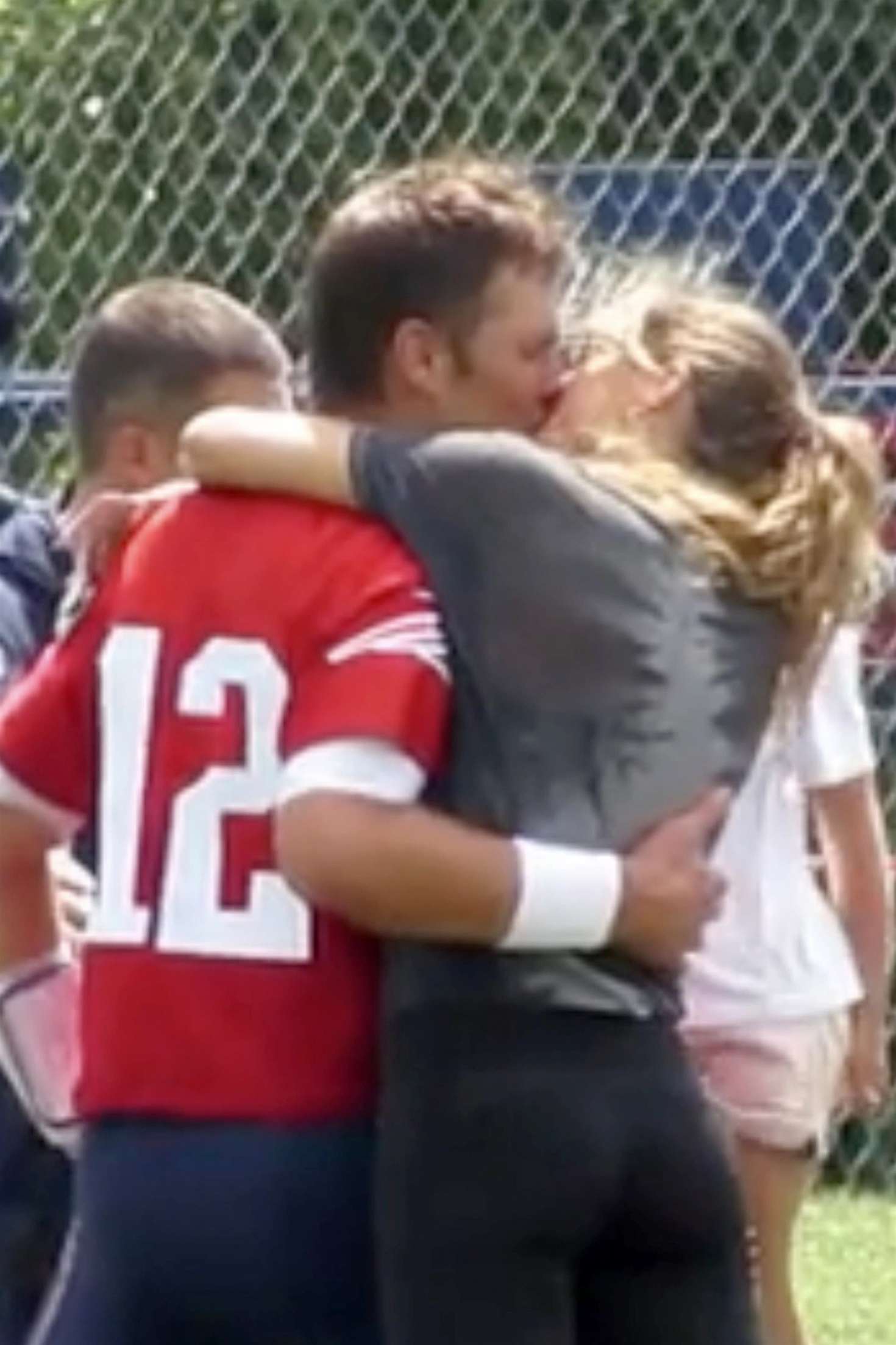 Gisele Bundchen and Tom Brady â€“ Share a kiss in Foxborough