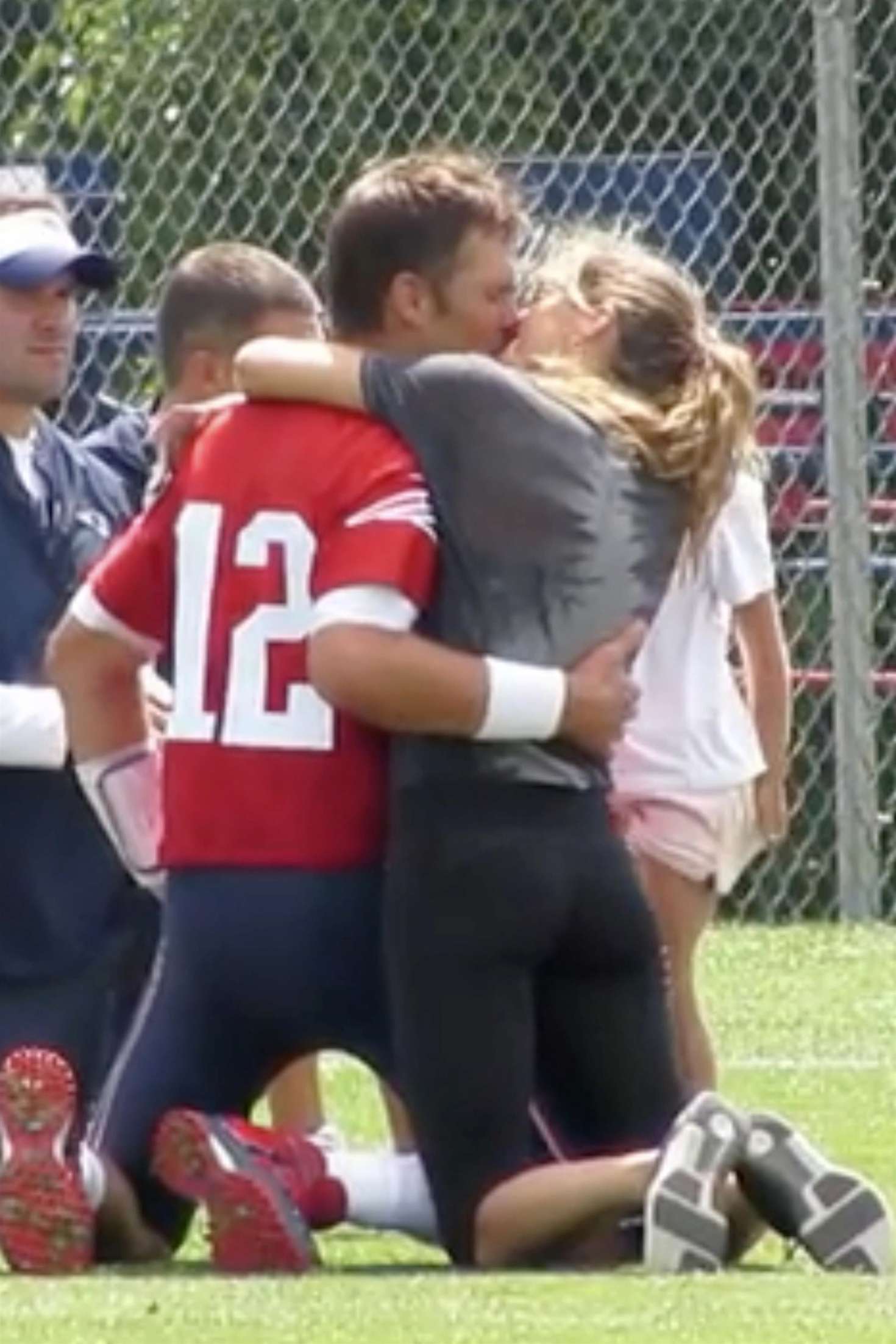 Gisele Bundchen and Tom Brady â€“ Share a kiss in Foxborough