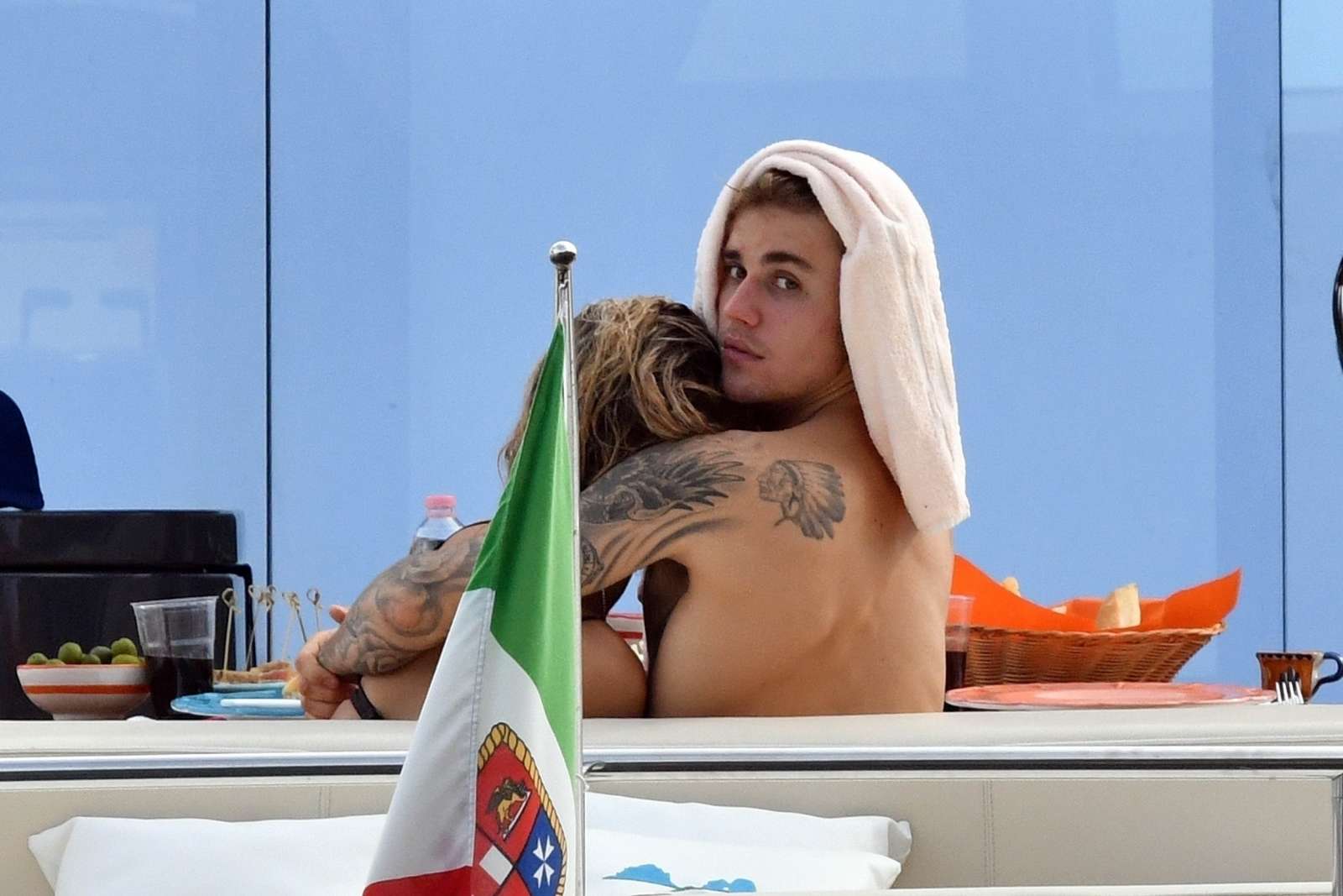 Hailey Baldwin in Black Bikini with Justin Bieber at a yacht in Italy