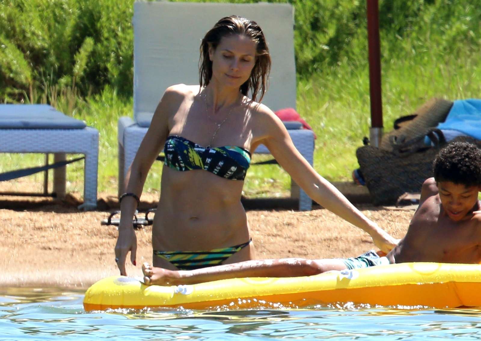 Heidi Klum in Bikini at the beach in Corsica