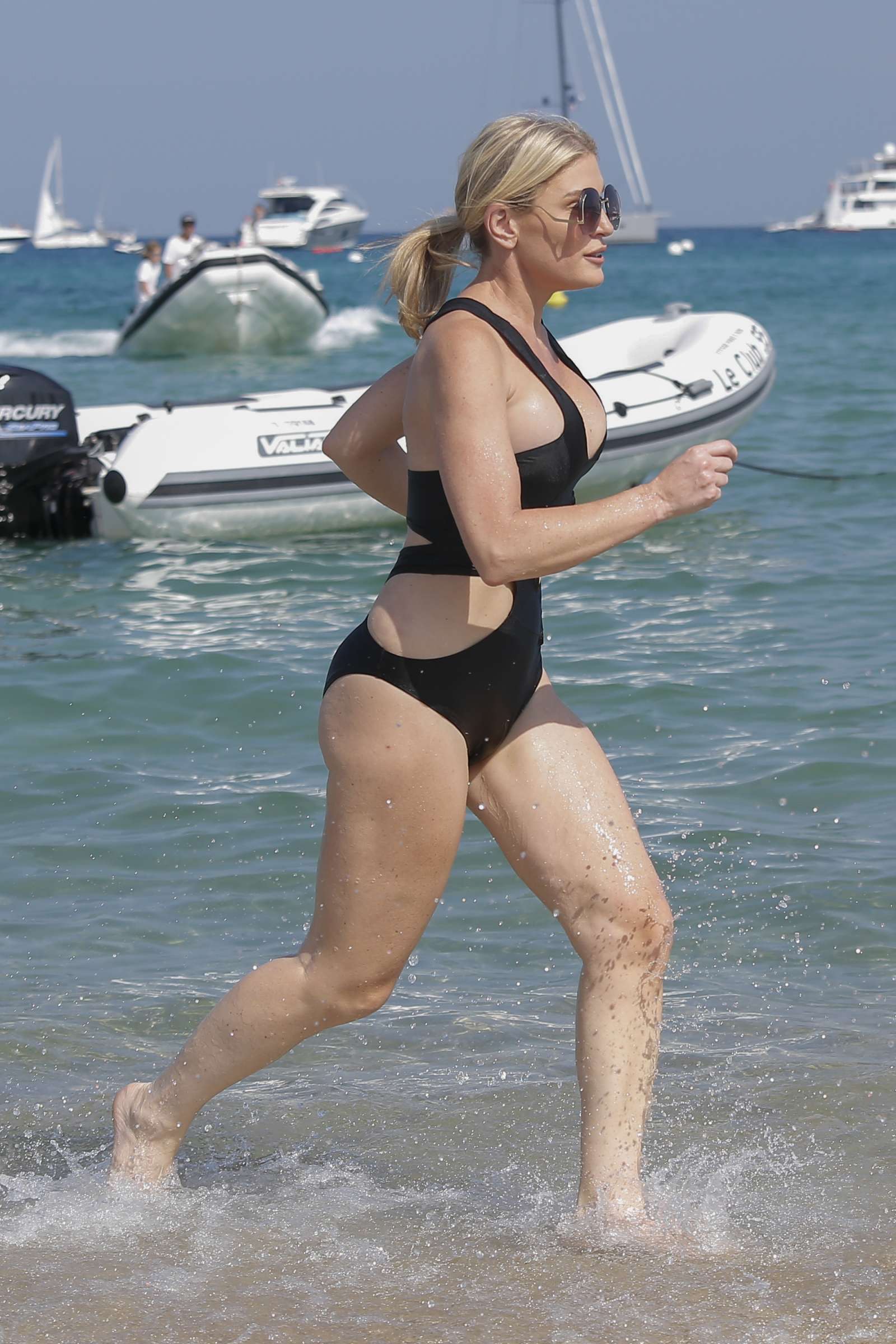 Hofit Golan in Black Swimsuit at the beach in Saint Tropez