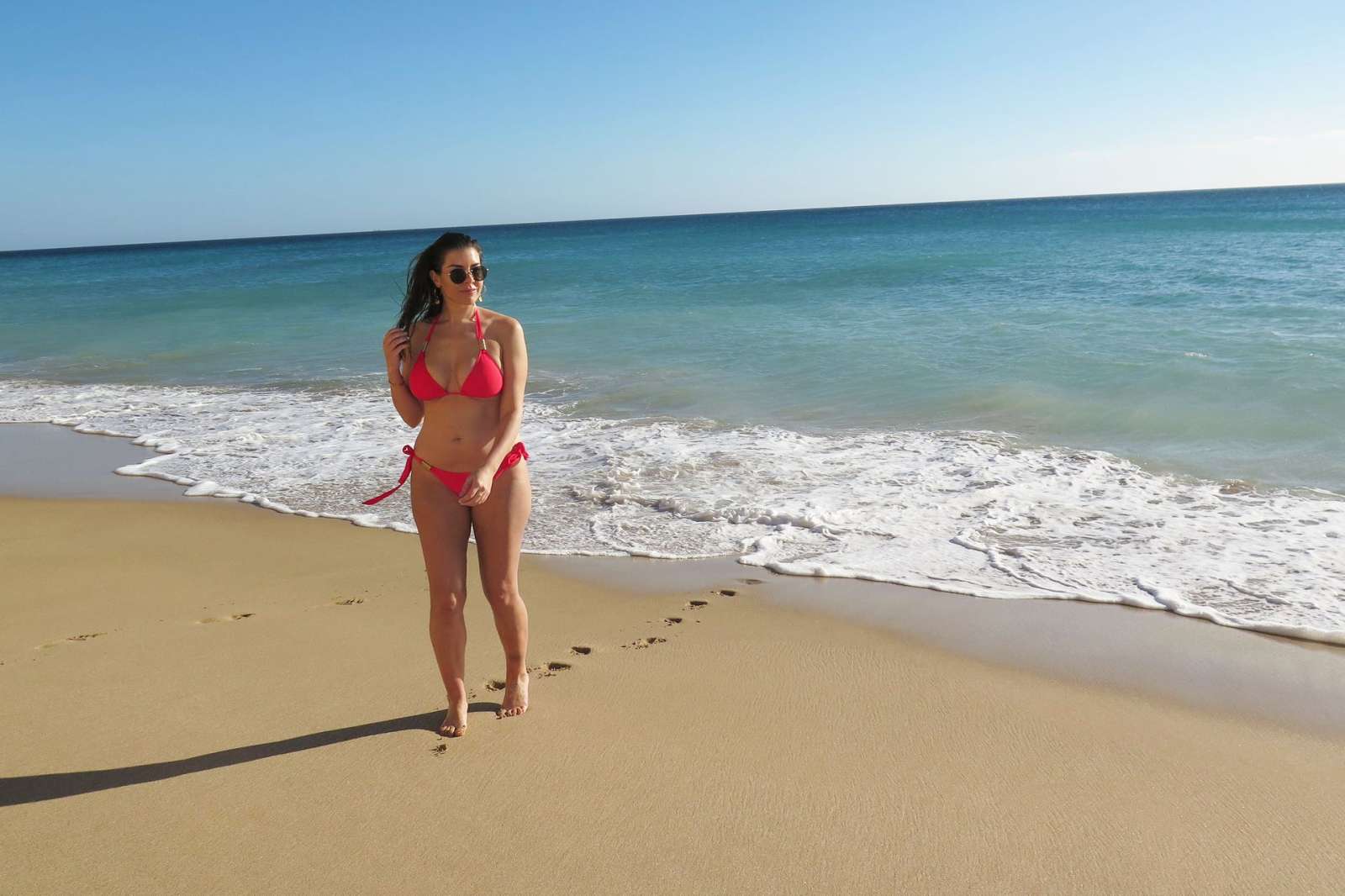 Imogen Thomas in Red Bikini on a beach in Portugal