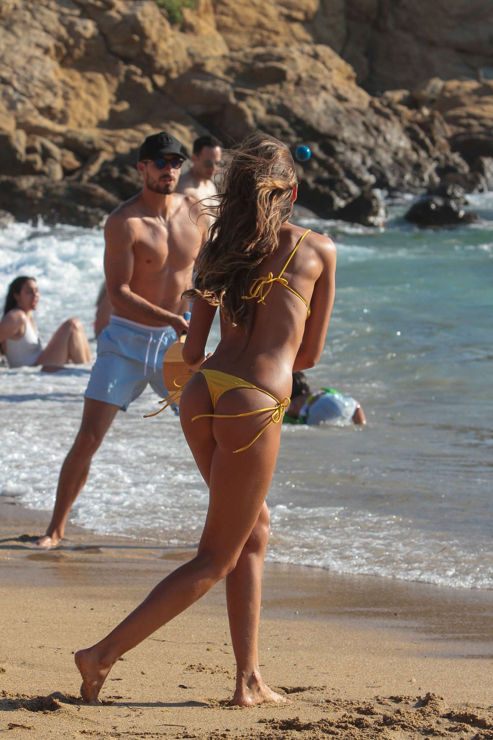 Izabel Goulart in Yellow Bikini at the beach in Mykonos