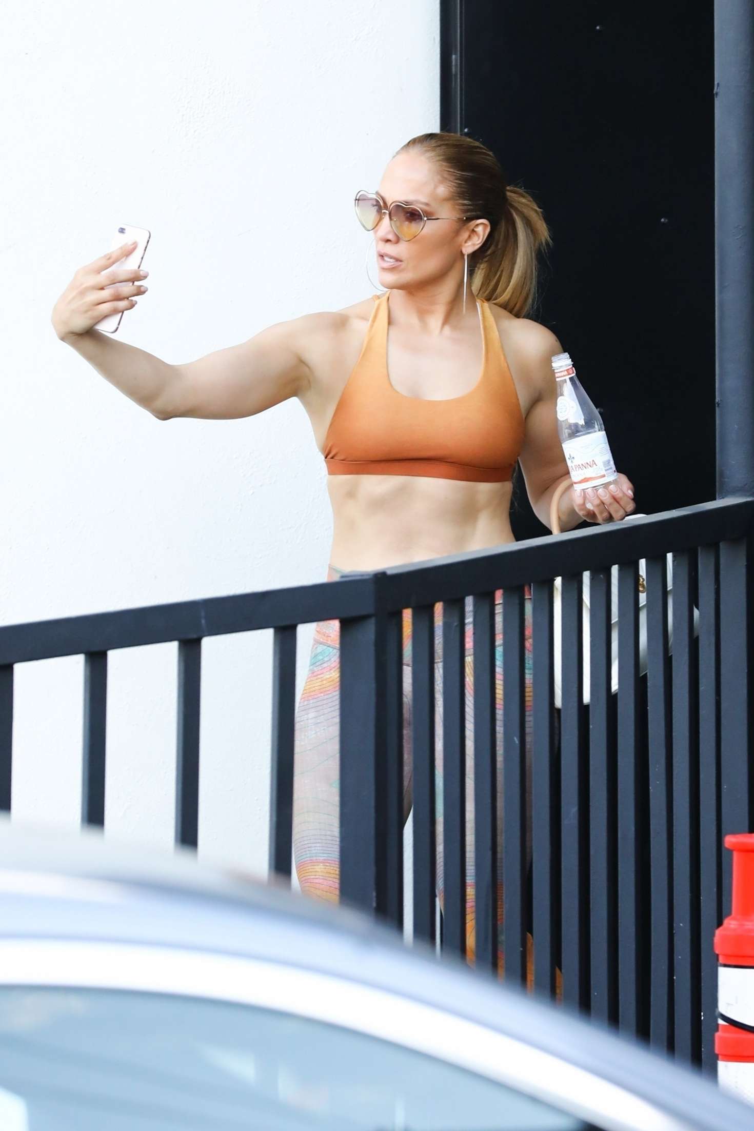 Jennifer Lopez in Orange Sports Bra and Leggings â€“ Leaves a workout in Brentwood