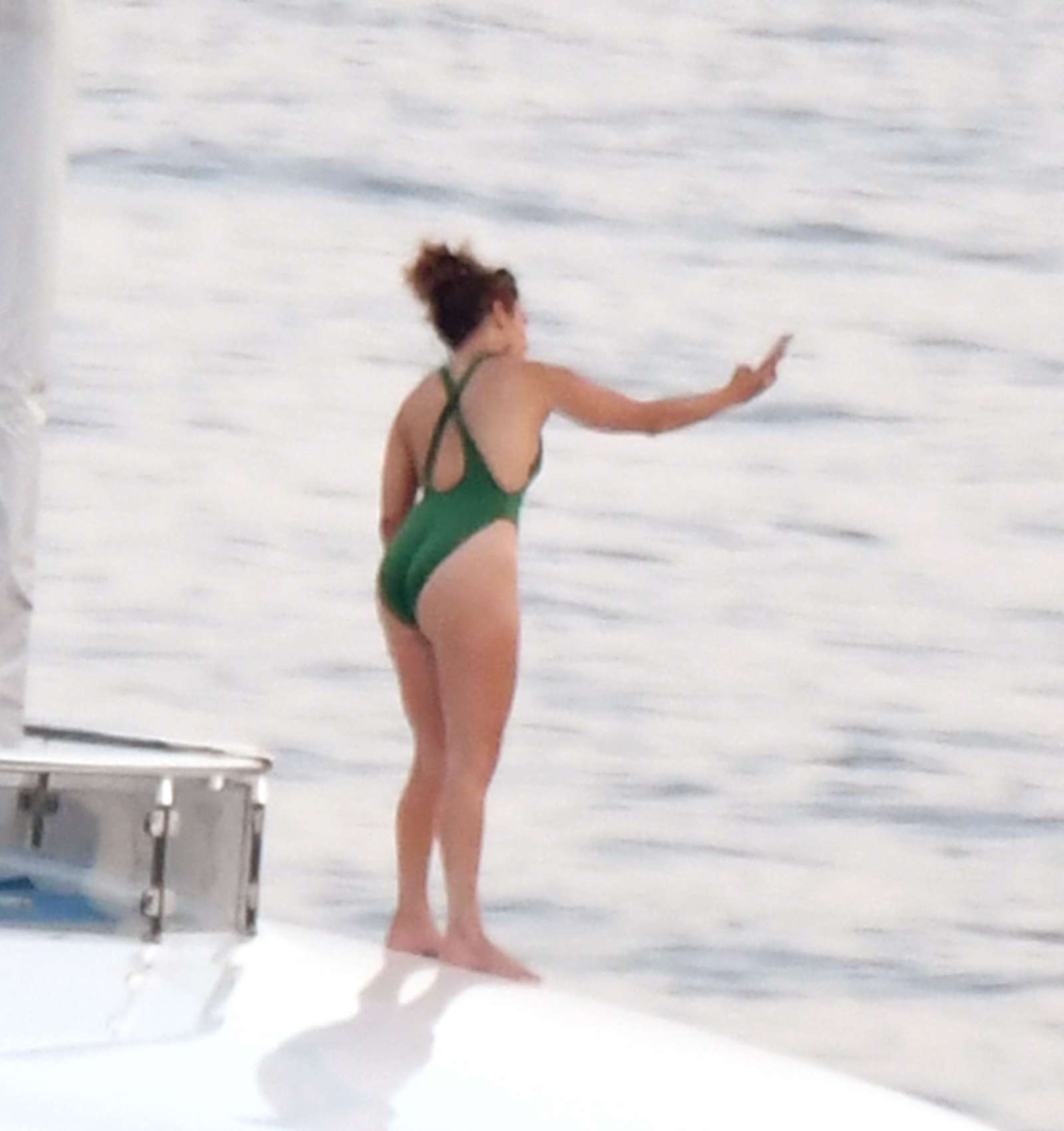 Jennifer Lopez in Swimsuit on the boat in Italy