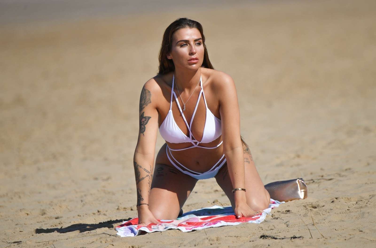 Jennifer Thompson in White Bikini on the beach in Alicante