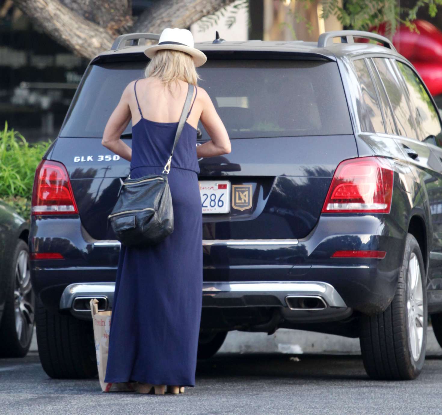 Photo of Julie Benz  - car
