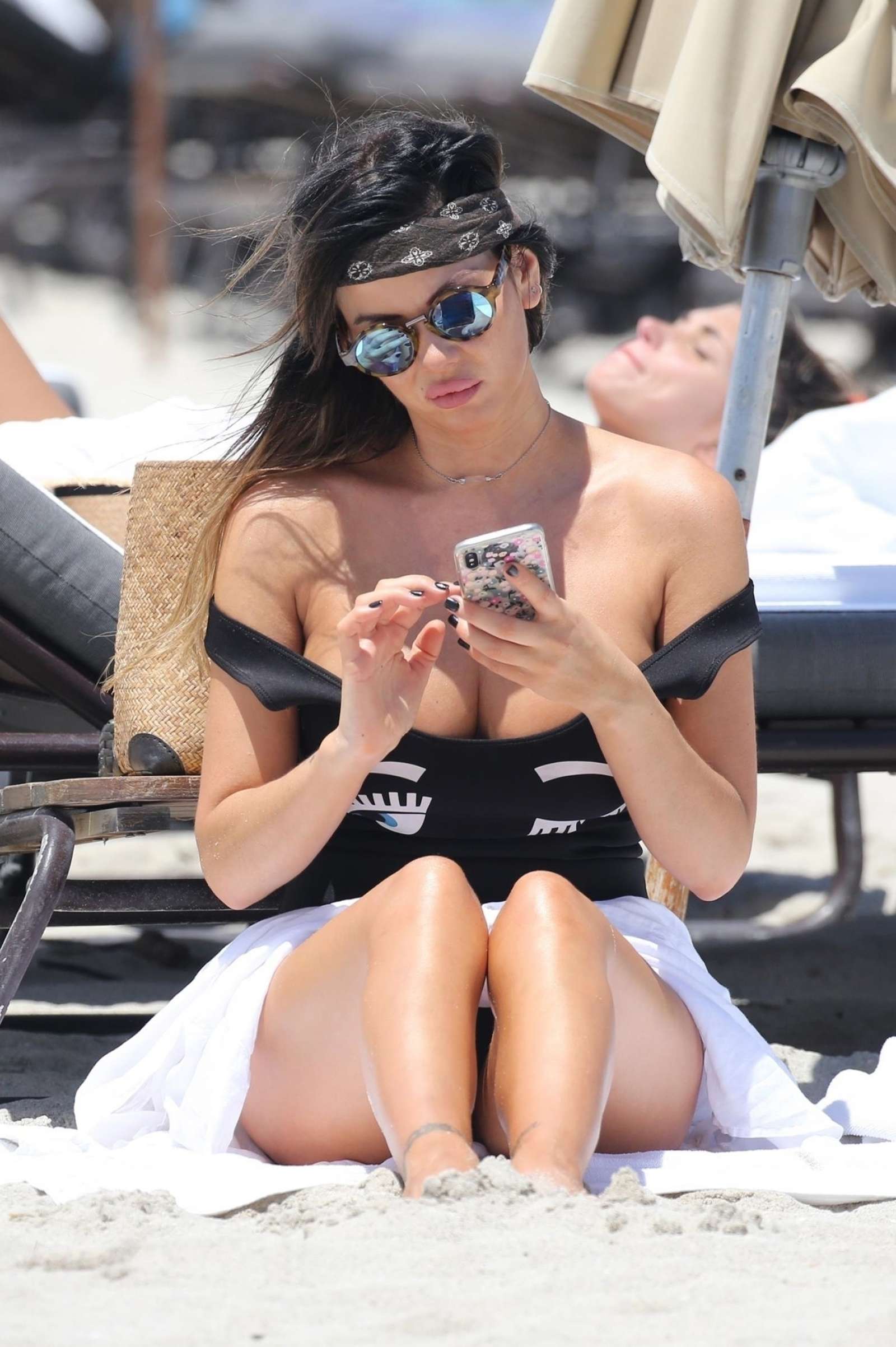 Karina Jelinek in Black Swimsuit at the beach in Miami
