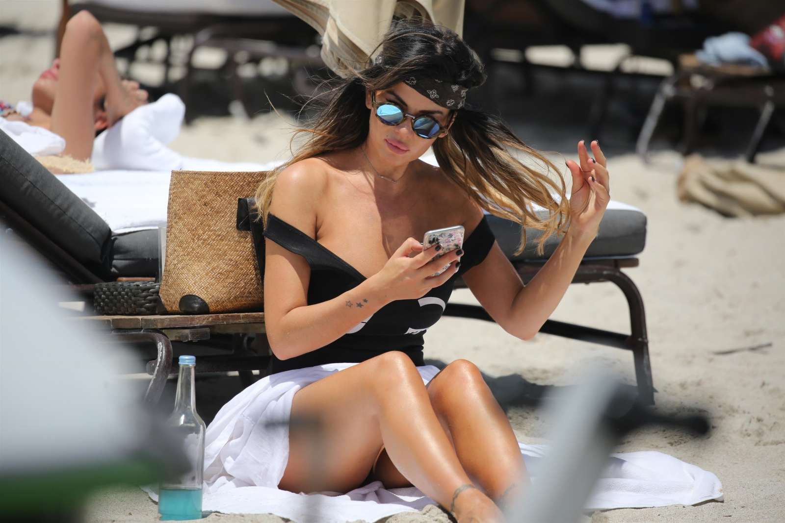 Karina Jelinek in Black Swimsuit at the beach in Miami