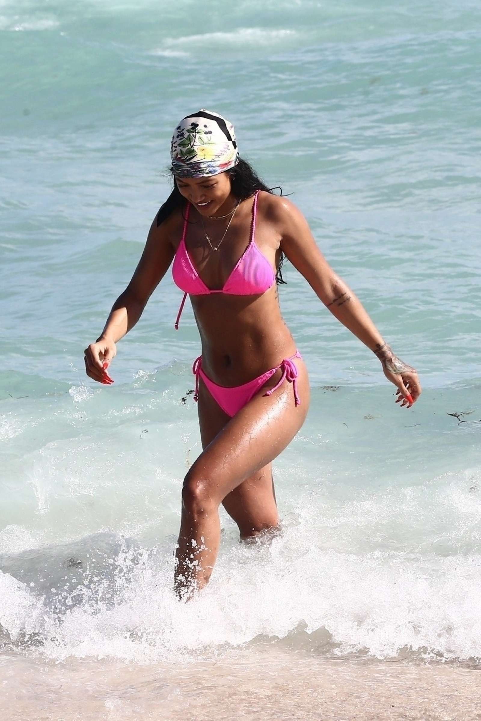 Karrueche Tran in Pink Bikini on the beach in Miami