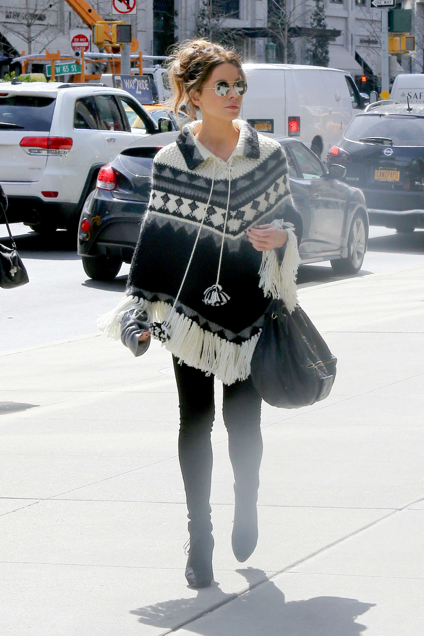 Kate Beckinsale in a black and white Poncho in NYC