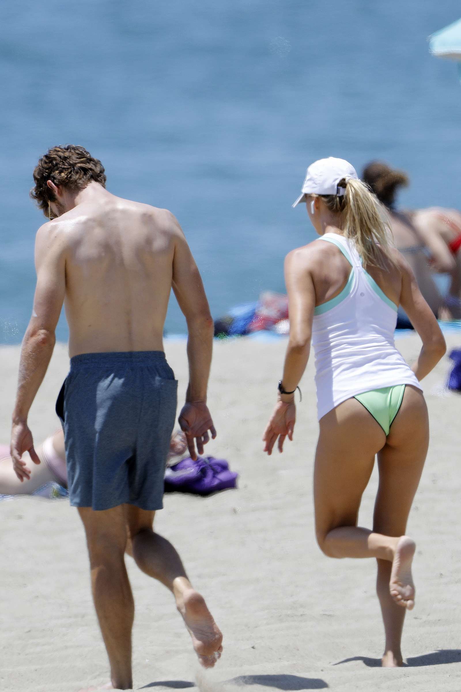 Kelly Rohrbach in Bikini on the beach in Malibu