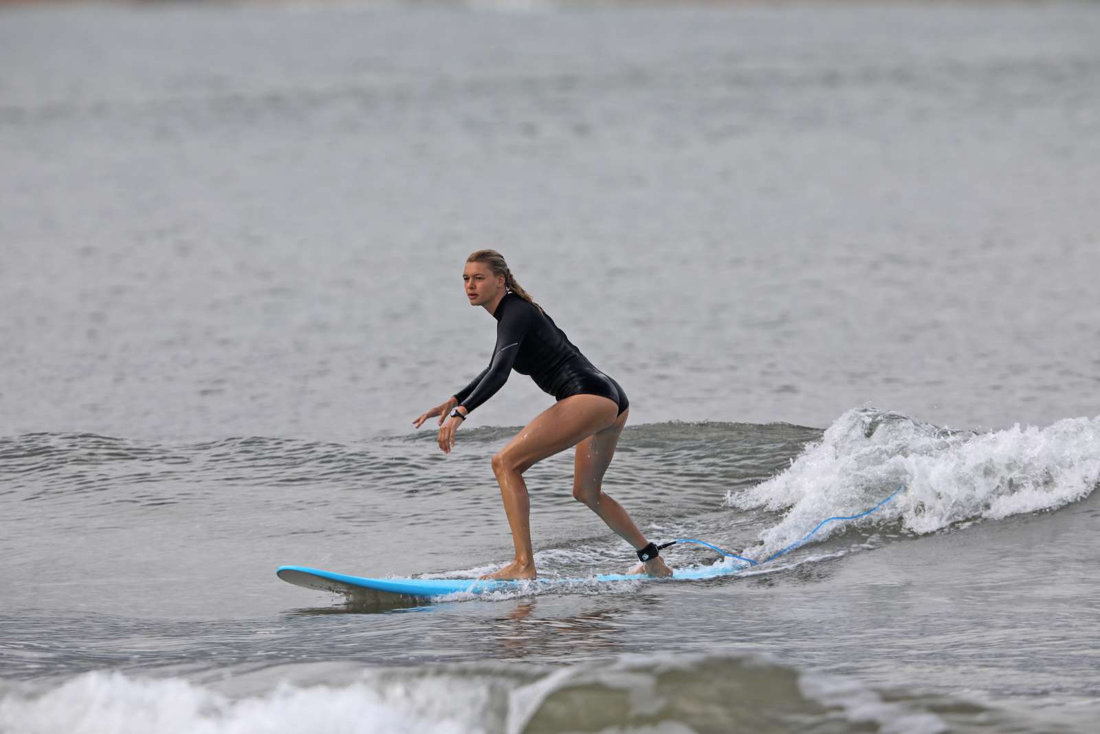 Kelly Rohrbach in Leopard Bikini Surfing in Hawaii