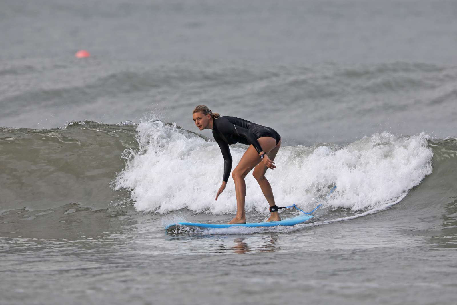 Kelly Rohrbach in Leopard Bikini Surfing in Hawaii
