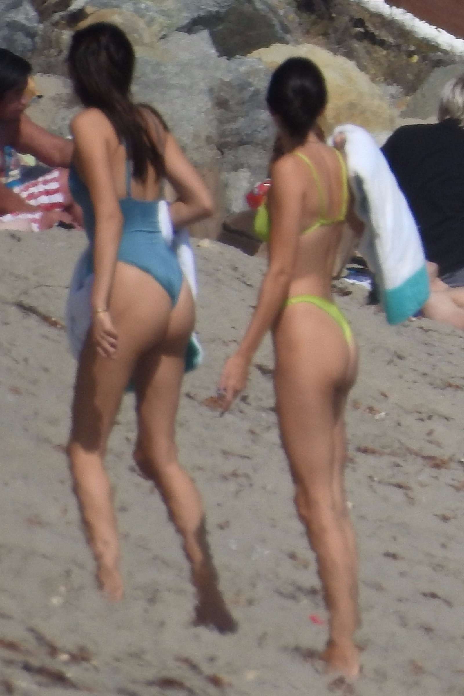 Kendall Jenner in a skimpy neon green bikini on the beach in Malibu