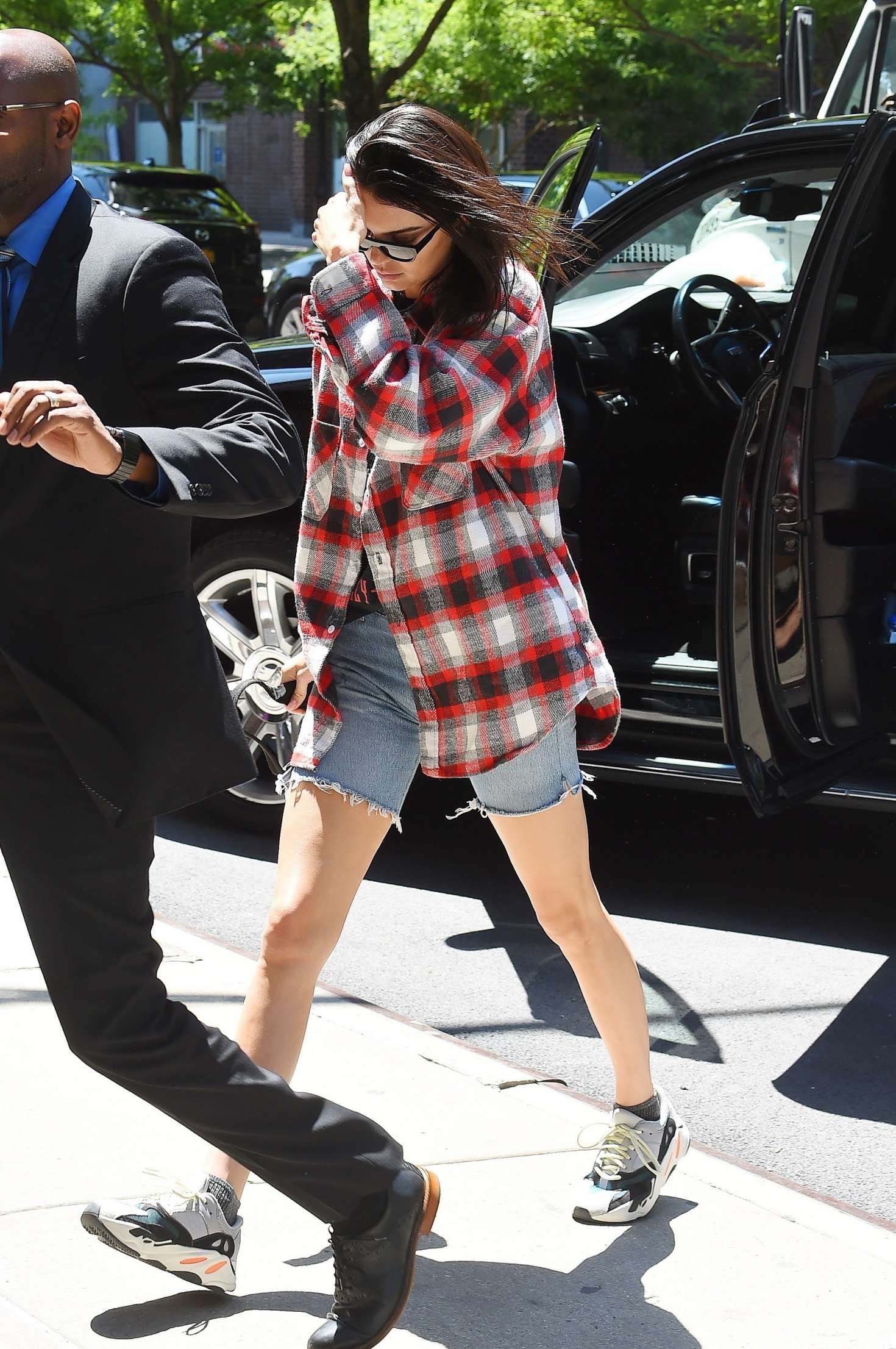Kendall Jenner â€“ Wearing a Plaid Oversized Shirt and Denim Shorts out in Tribeca